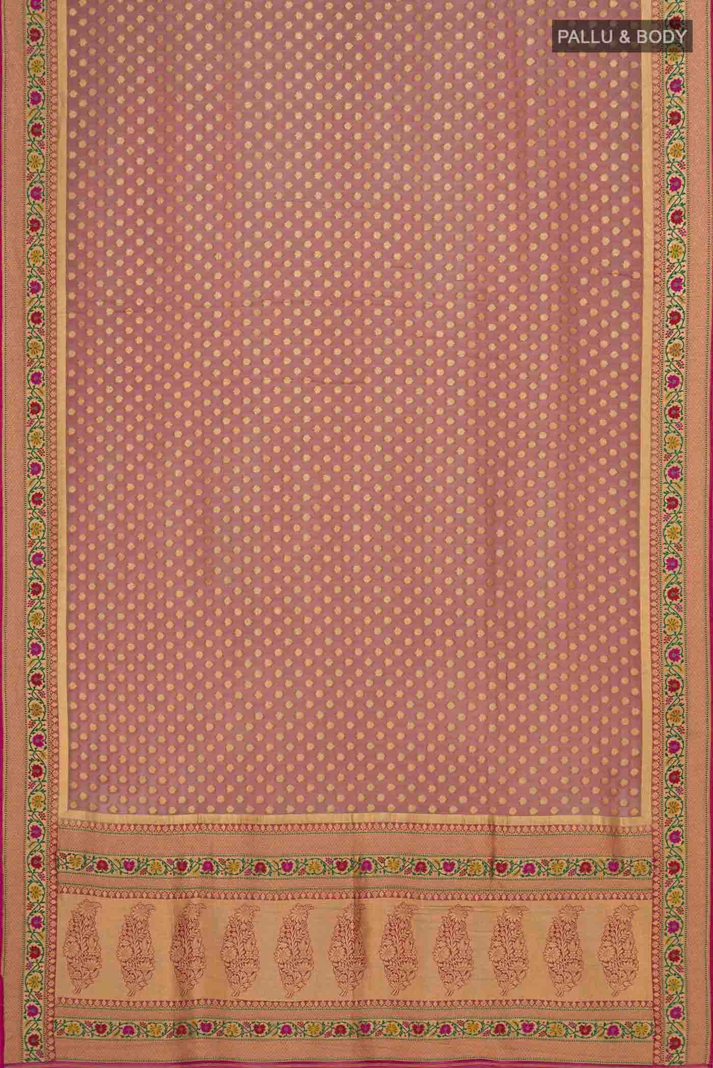 Flat view of Mauve Banarasi Georgette Saree with Zari Butta on the body and Zari Border. 