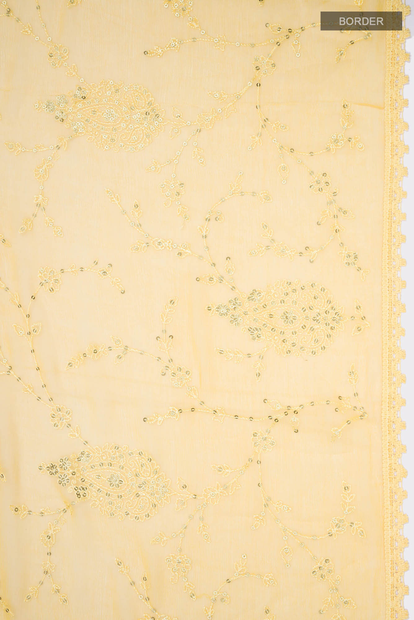 Border image of Yellow Blended Chiffon Saree with Embroidery on the body and Lace Border. 