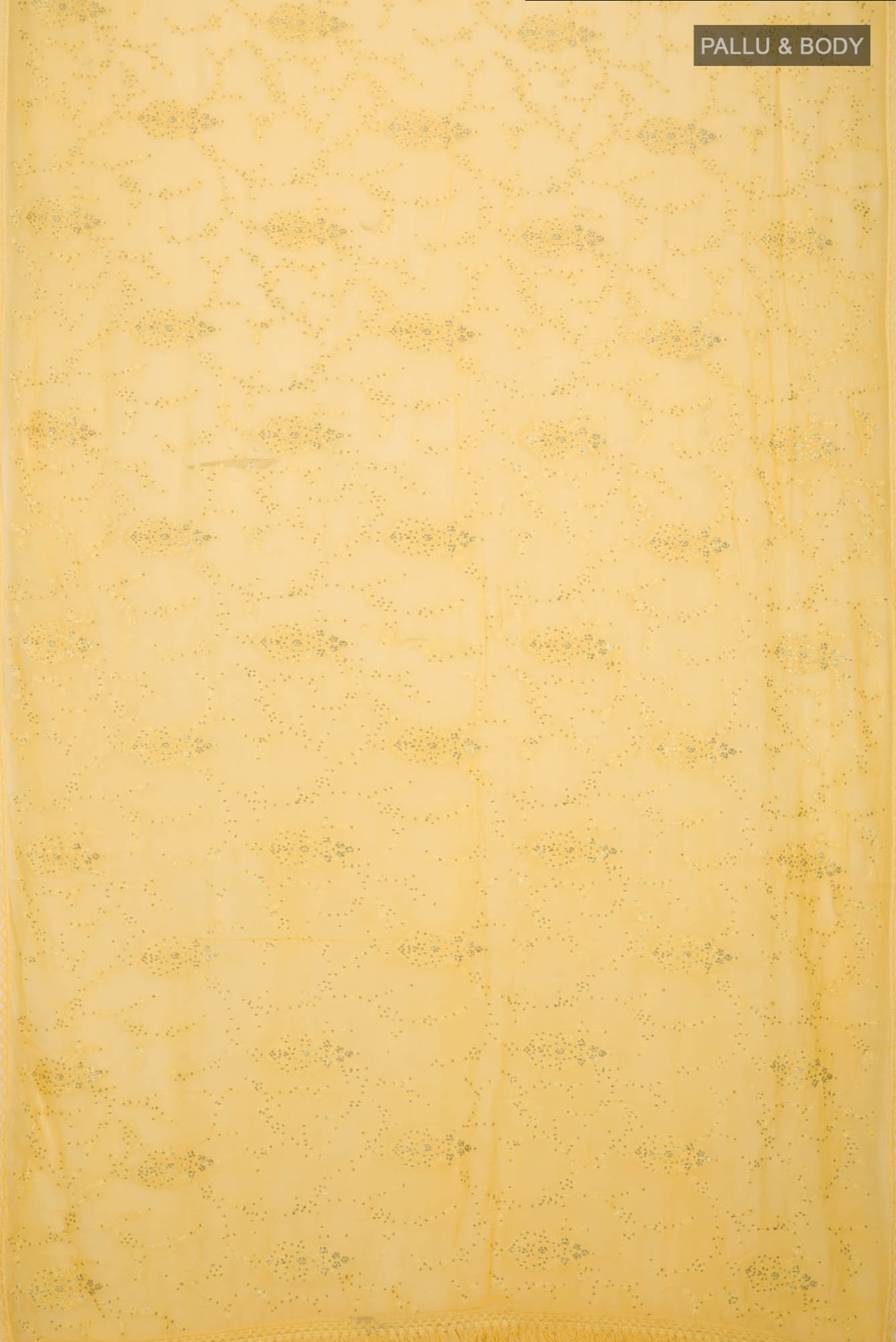 Flat view of Yellow Blended Chiffon Saree with Embroidery on the body and Lace Border. 