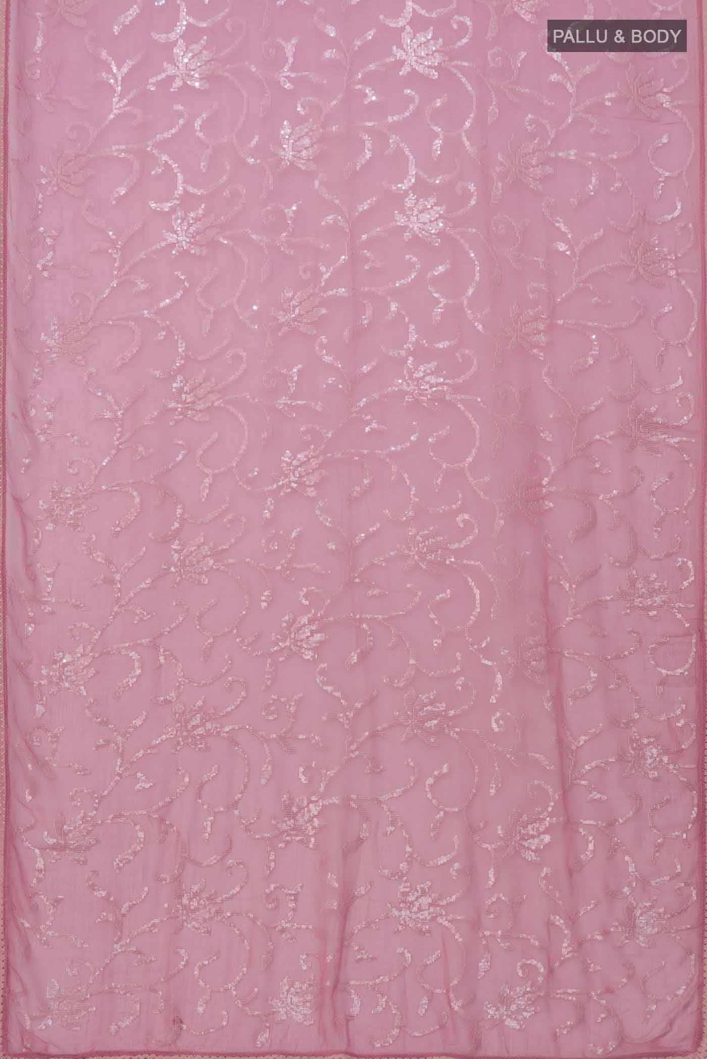 Flat view of Pink Blended Chiffon Saree with Embroidery on the body and Lace Border. 