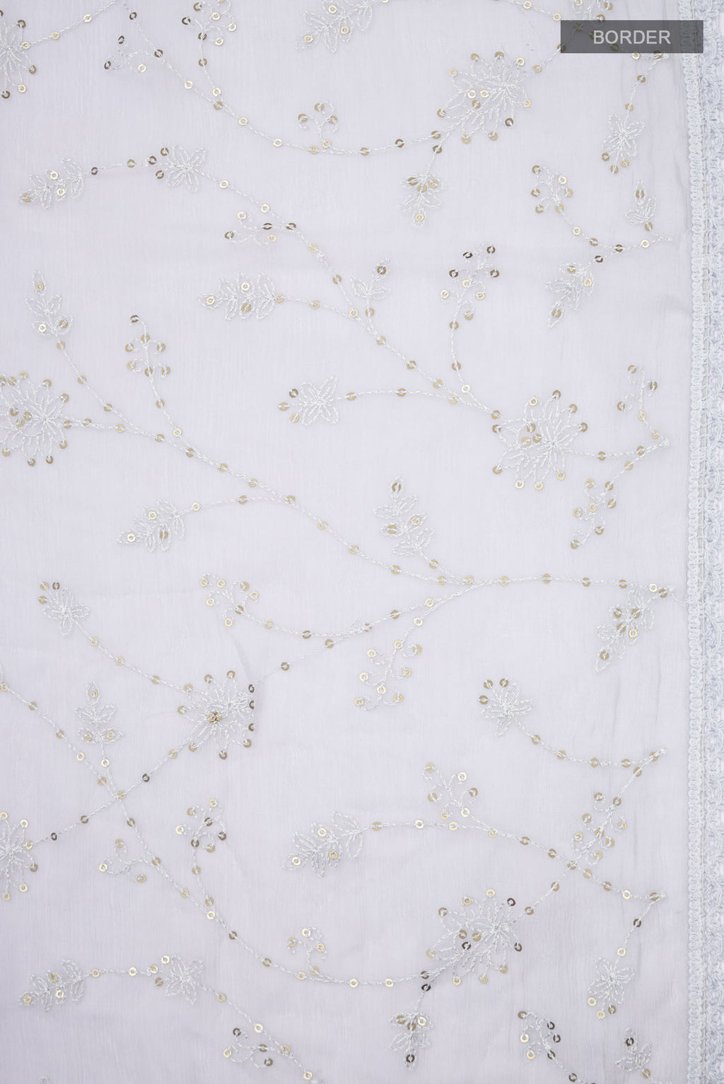 Border image of Grey Blended Chiffon Saree with Embroidery on the body and Lace Border. 