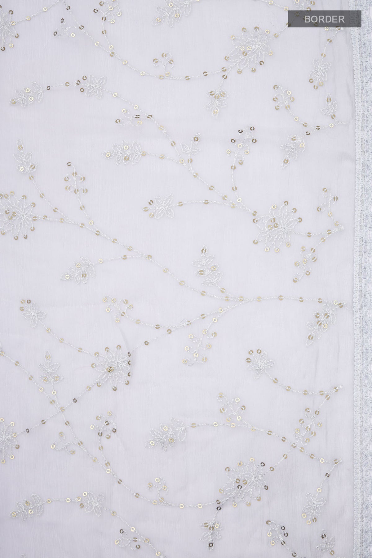 Border image of Grey Blended Chiffon Saree with Embroidery on the body and Lace Border. 