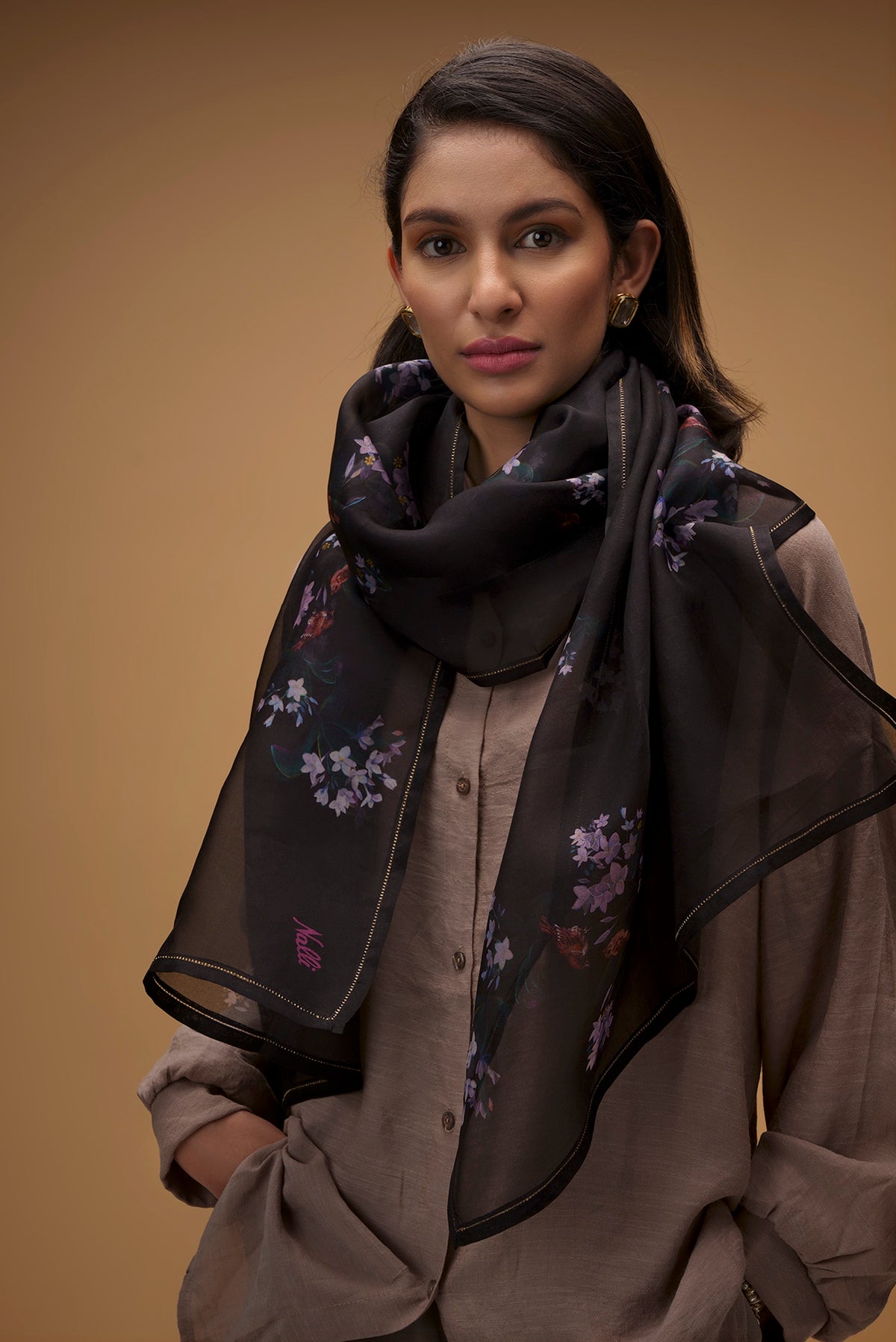 Close up image of the pallu of Black Pure Organza Silk Saree with Bird Print on the body and Without Border