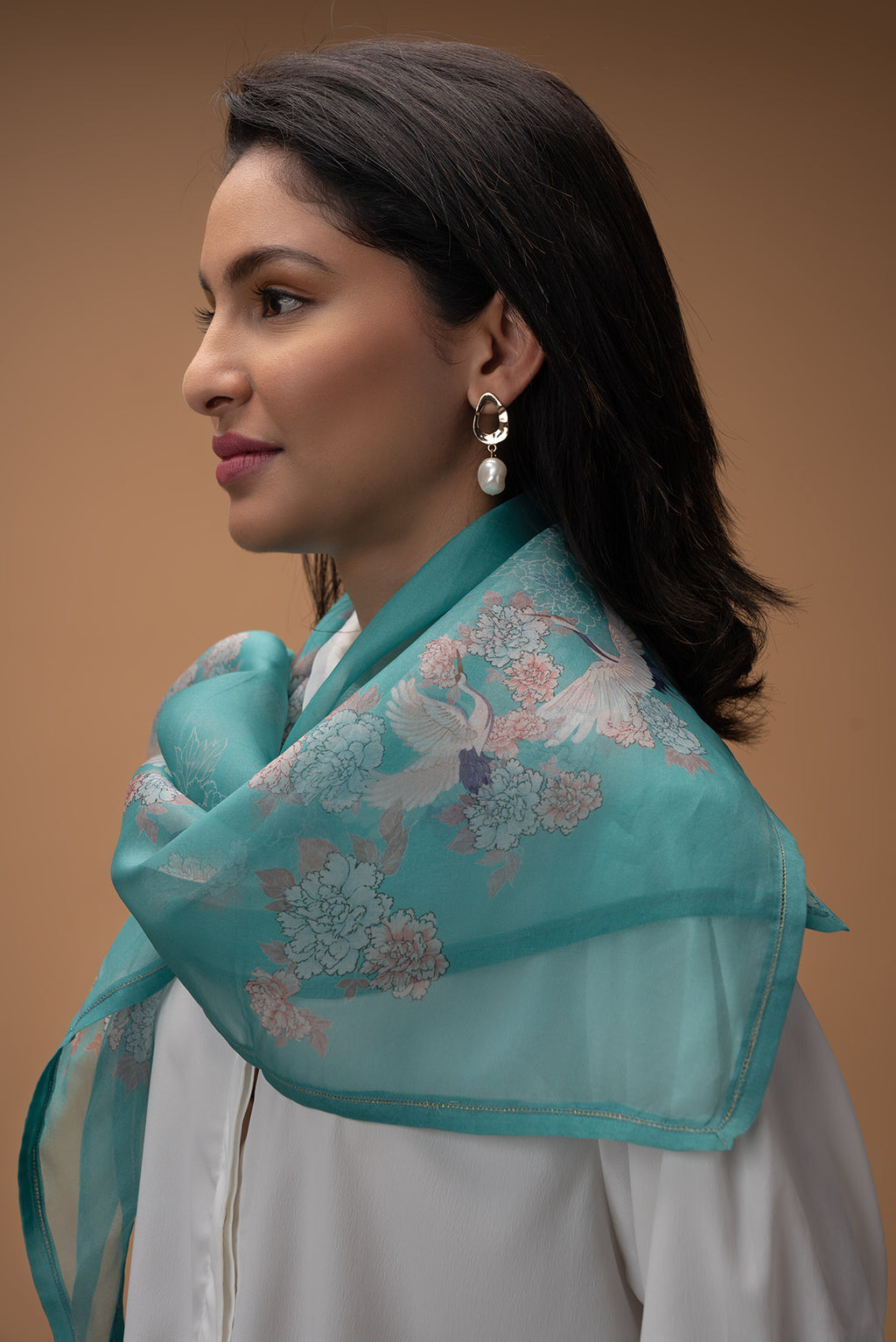 Close up image of the pallu of Blue Pure Organza Silk Saree with Bird Print on the body and Without Border