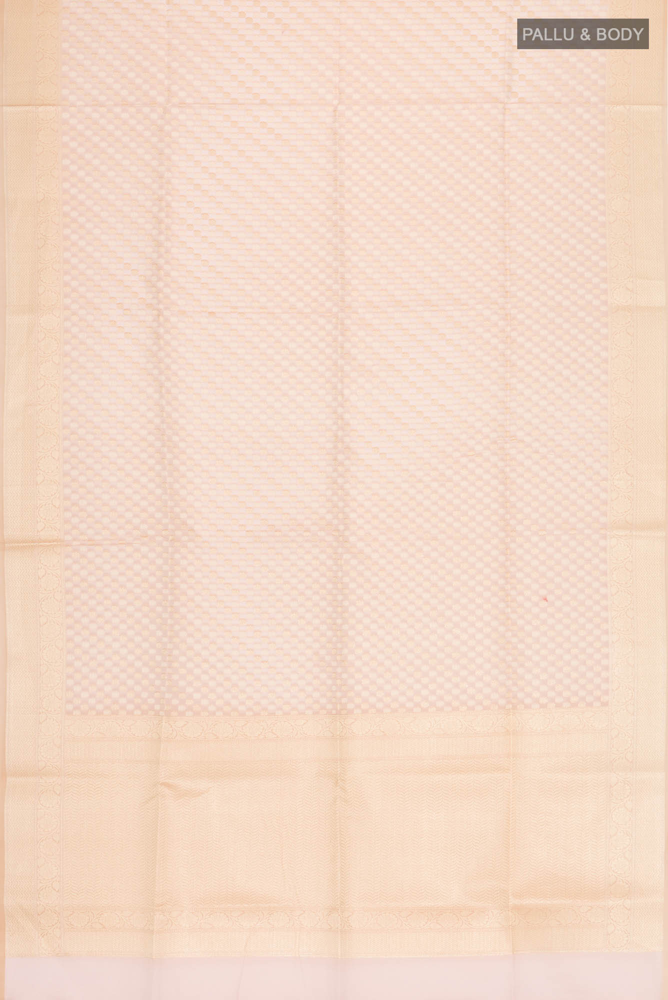 Flat view of Rose Gold Blended Kora Cotton Saree with Zari And Thread Butta on the body and Zari Border. 