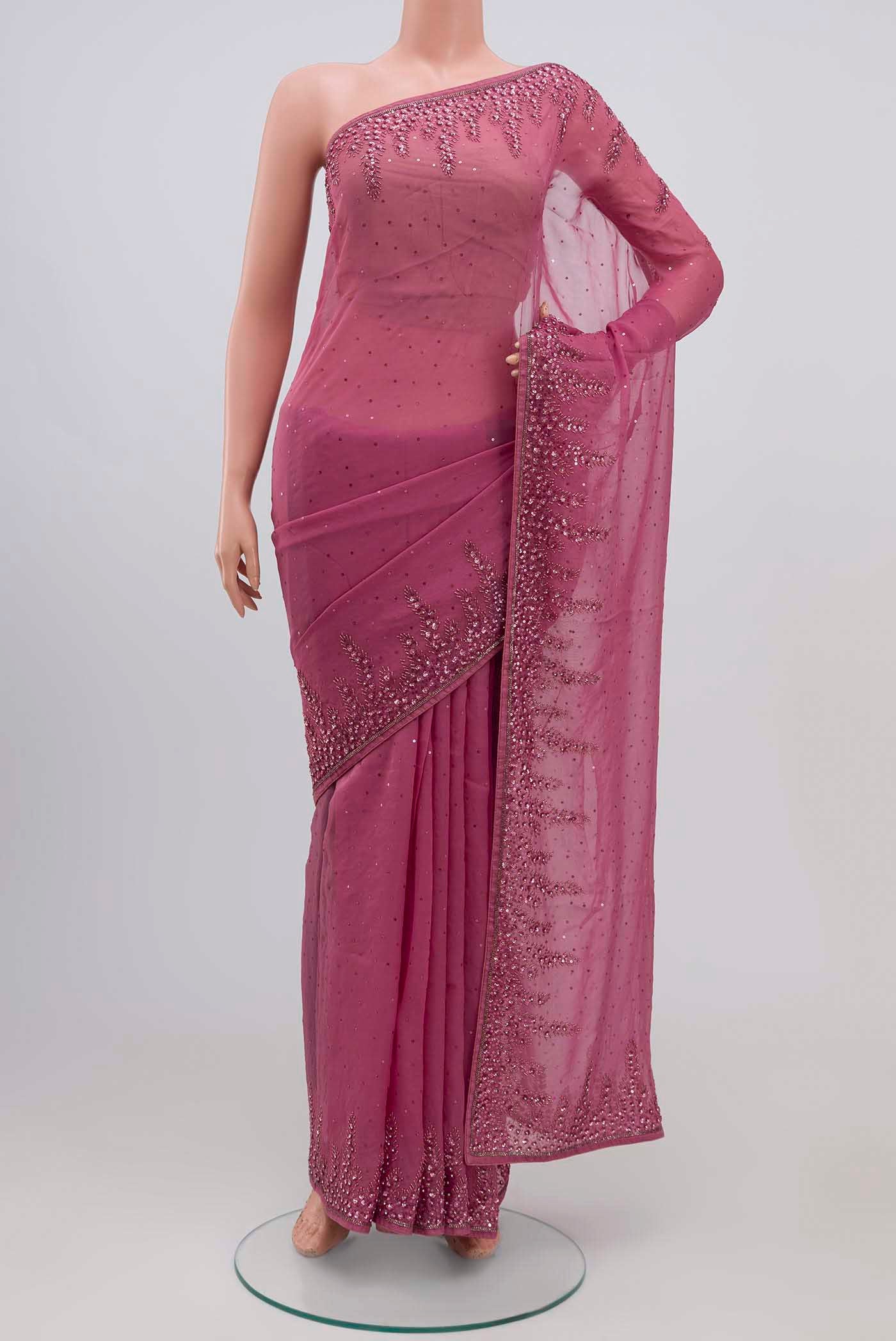 Mauve Blended Organza Silk Saree with Embroidery on the body and Fancy Border.  displayed on a mannequin