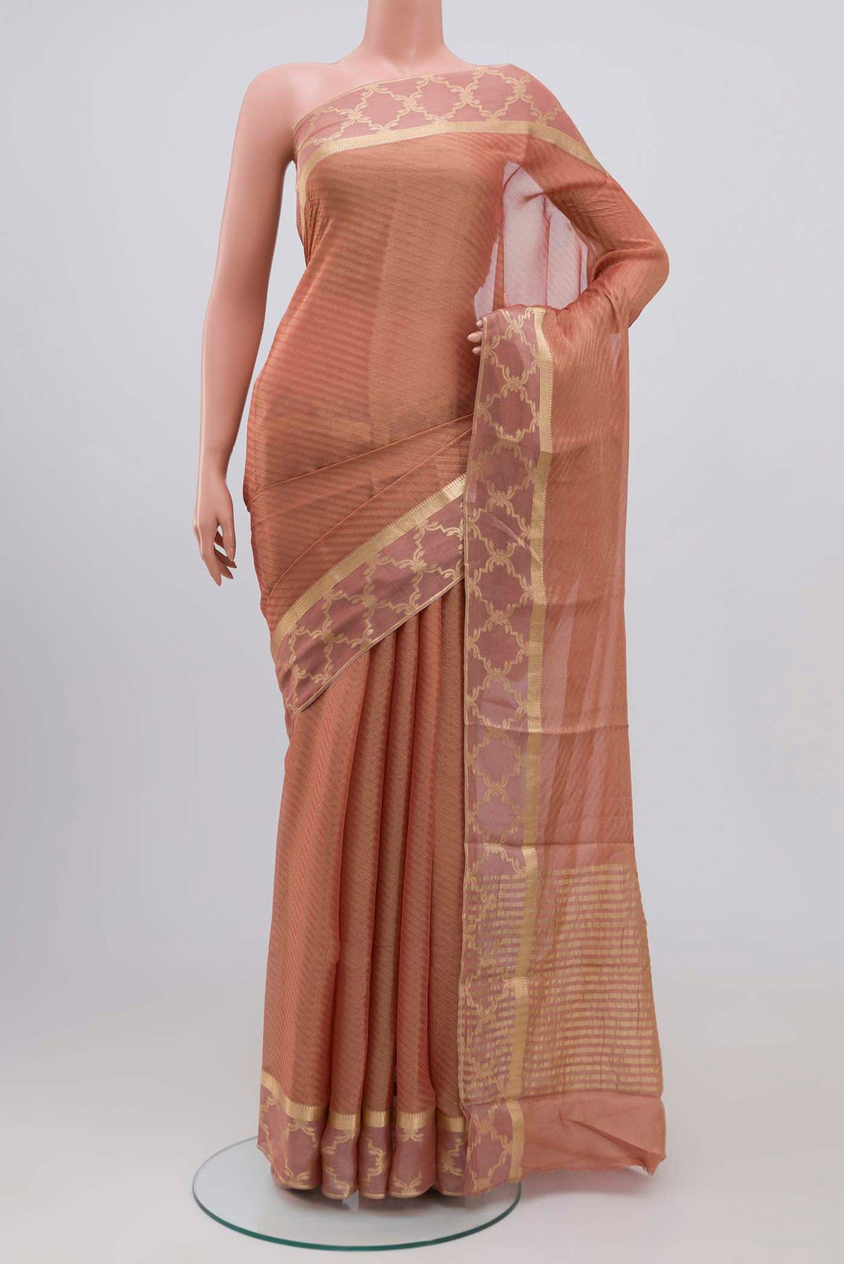 Peach Mysore Georgette Saree with Zari Brocade on the body and Zari Border.  displayed on a mannequin