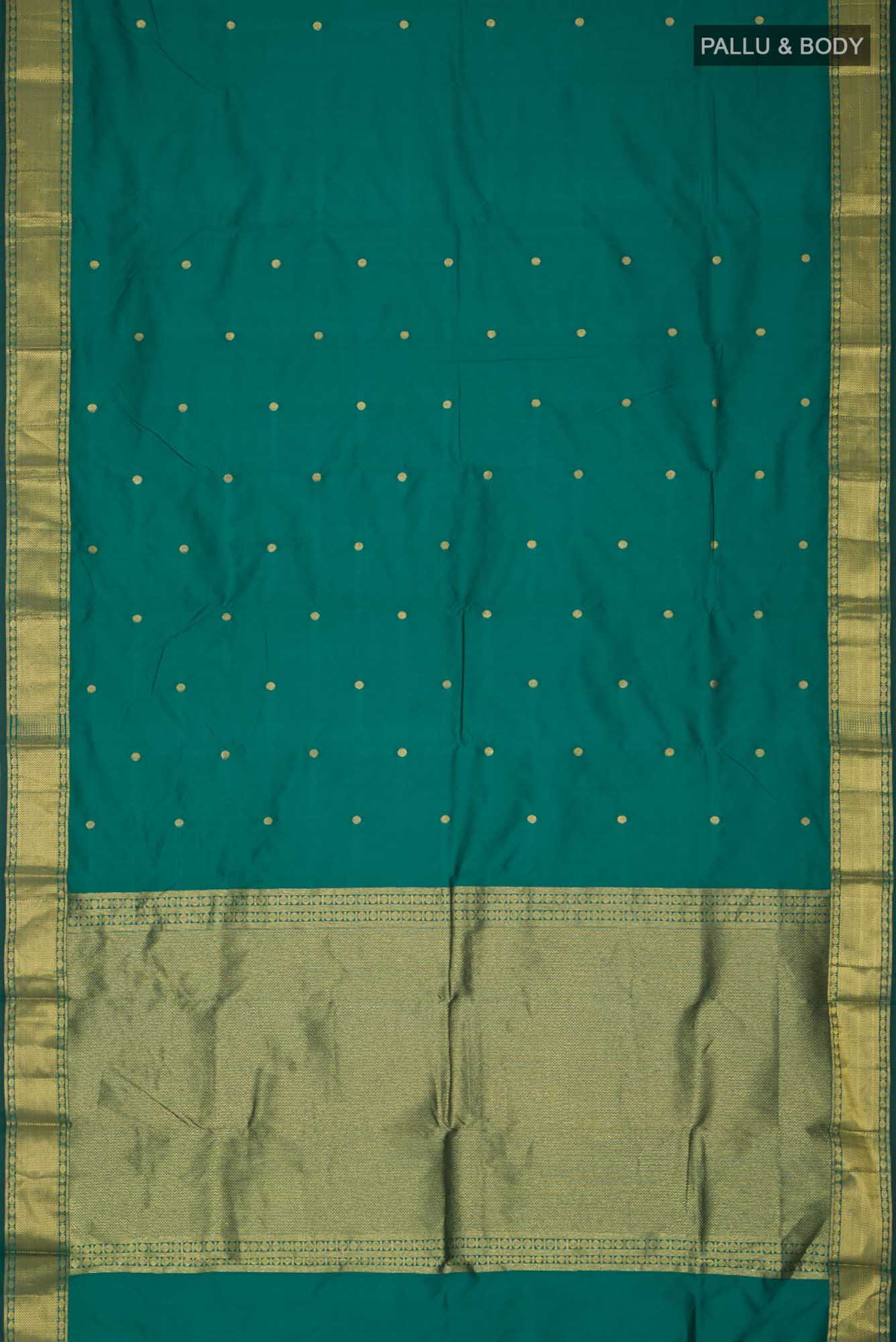 Flat view of Green Blended Bangalore Silk Saree with Zari Butta on the body and Zari Border. 