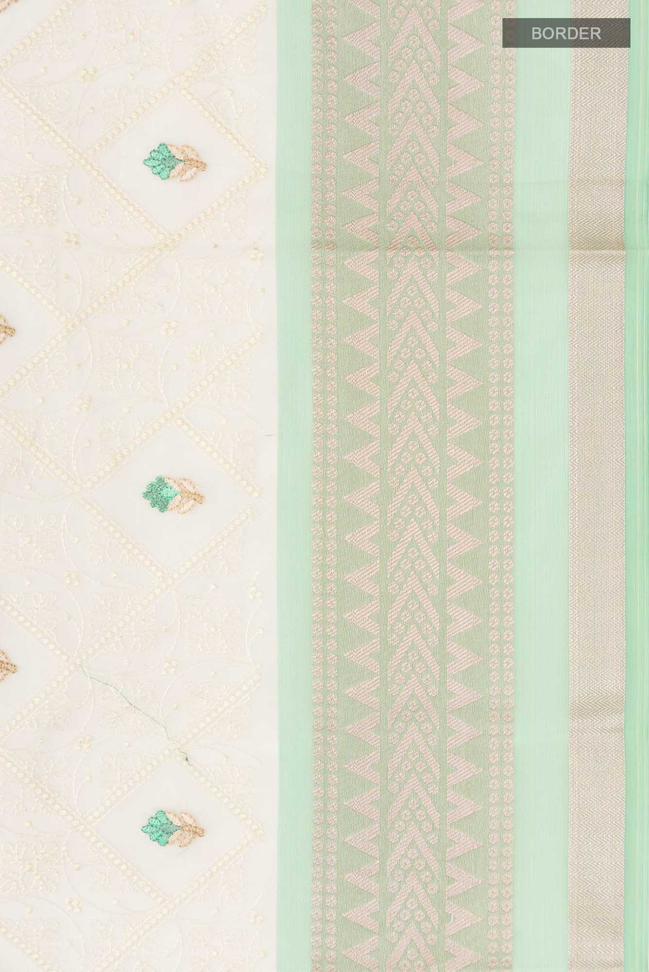 Border image of Cream Blended Kora Cotton Saree with Embroidery on the body and Zari Border. 