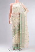 Cream Blended Kora Cotton Saree with Embroidery on the body and Zari Border.  displayed on a mannequin