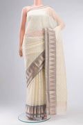 Cream Blended Kora Cotton Saree with Embroidery on the body and Zari And Thread Border.  displayed on a mannequin