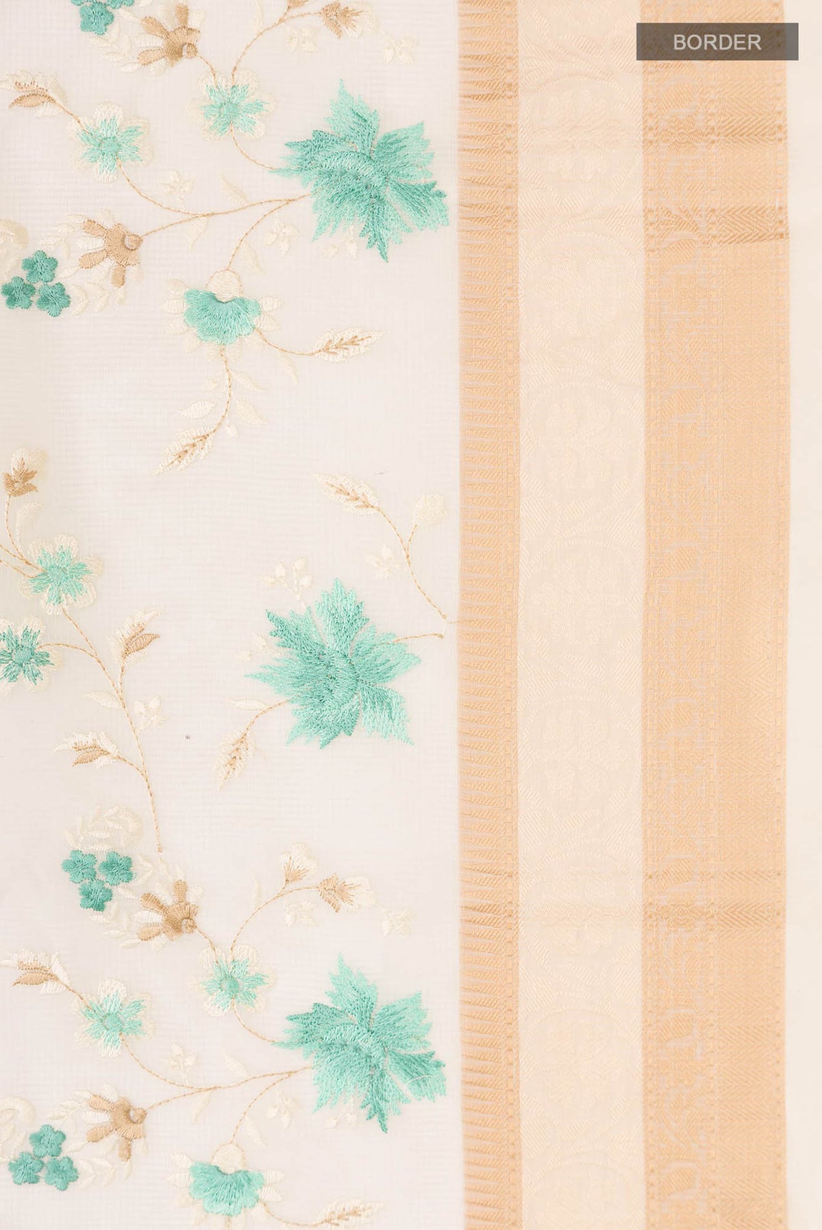 Border image of Cream Blended Kota Cotton Saree with Embroidery on the body and Thread Border. 