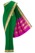 Green Kanchipuram Silk Saree with Plain Body and Zari Border.  displayed on a mannequin