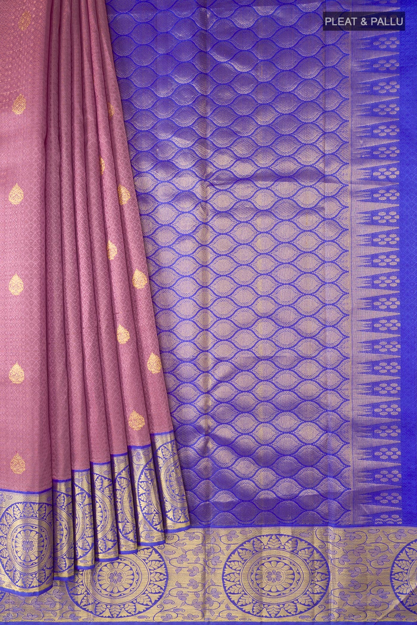 Pleats and pallu of Pink Kanjivaram Silk Saree with Jacquard With Zari Butta on the body and Zari Border. 