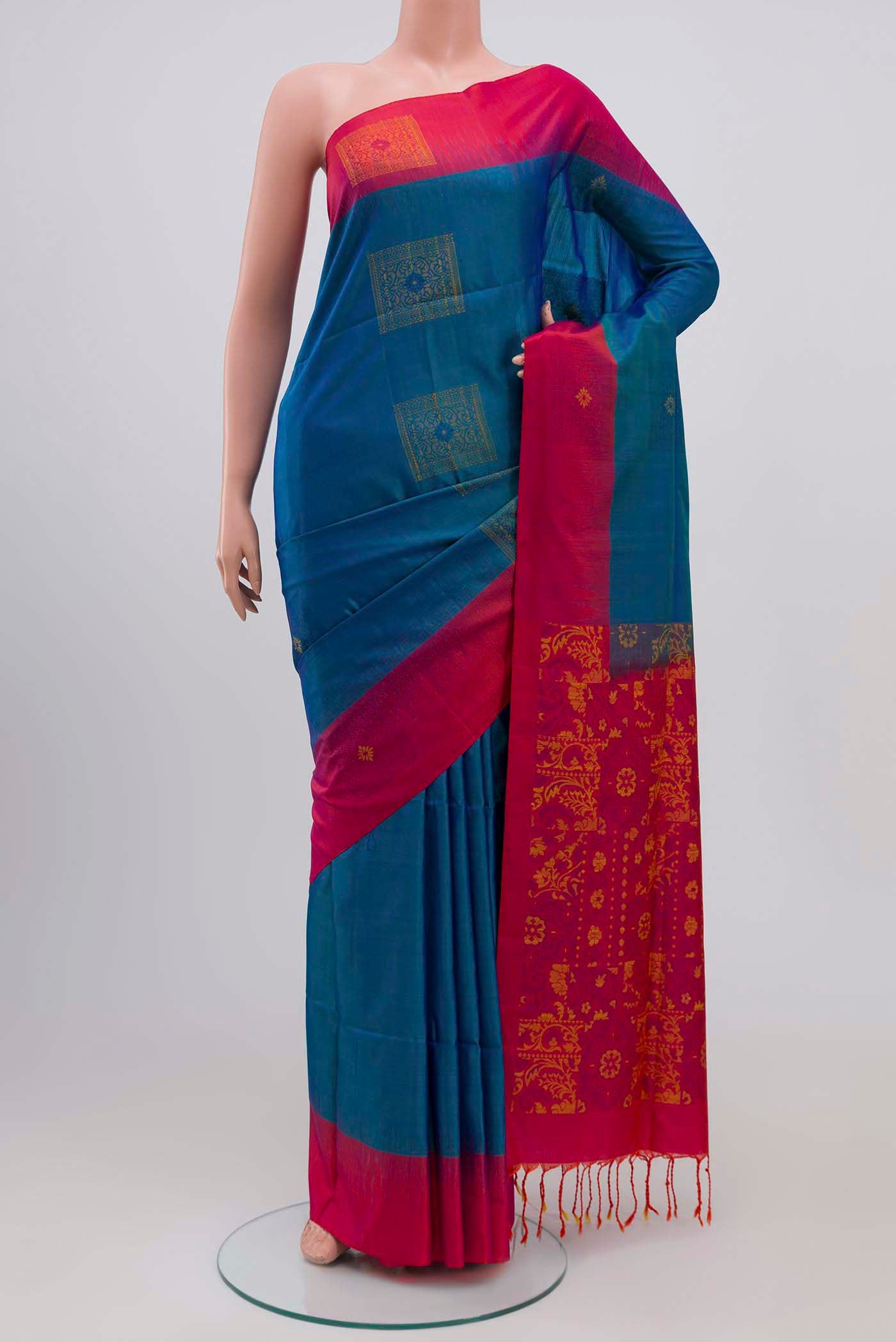 Blue Soft Silk Saree with Thread Butta on the body and Plain Border.  displayed on a mannequin