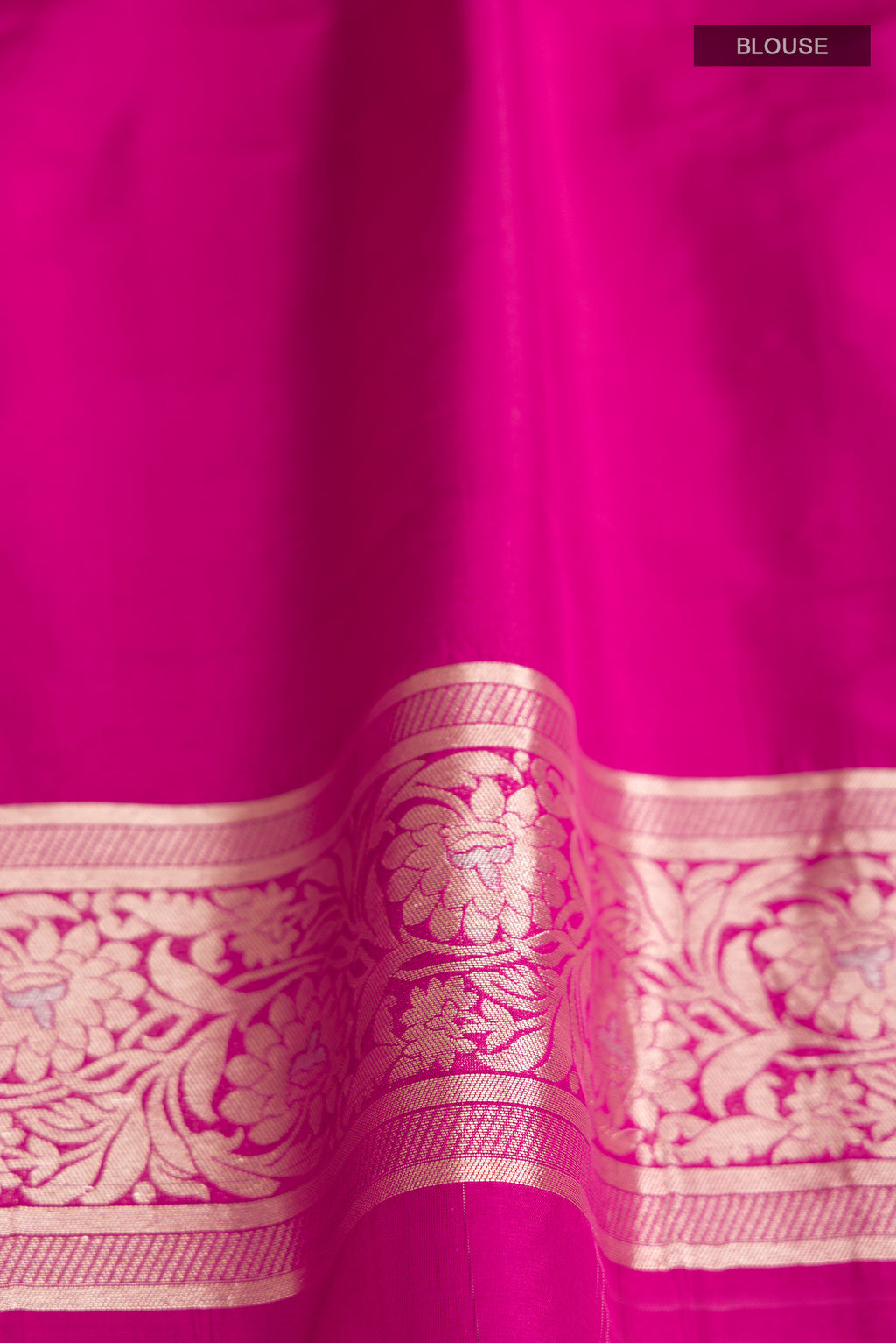 Close up image of the blouse of Pink Banarasi Silk Saree with Zari Brocade on the body and Zari Border