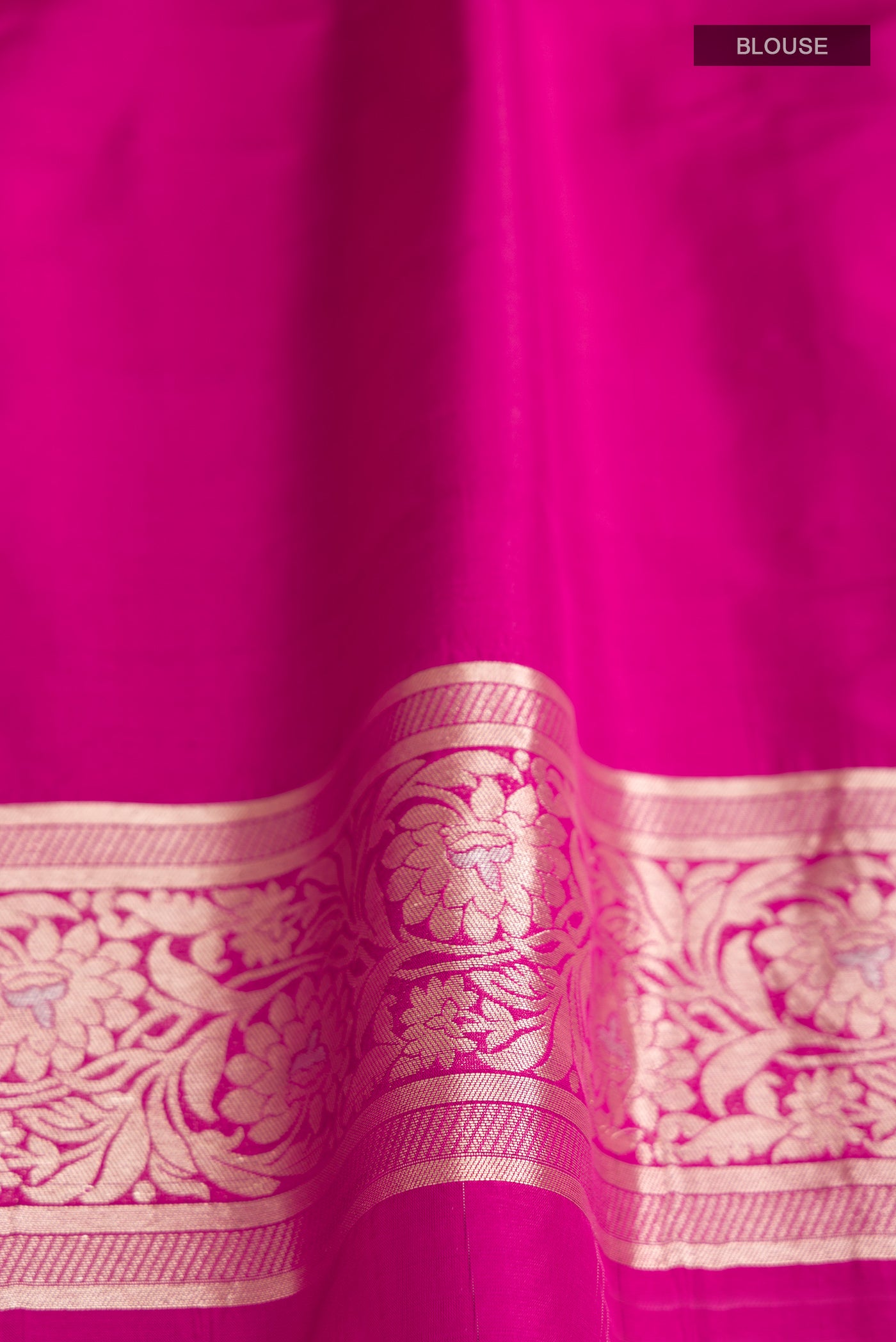 Close up image of the blouse of Pink Banarasi Silk Saree with Zari Brocade on the body and Zari Border