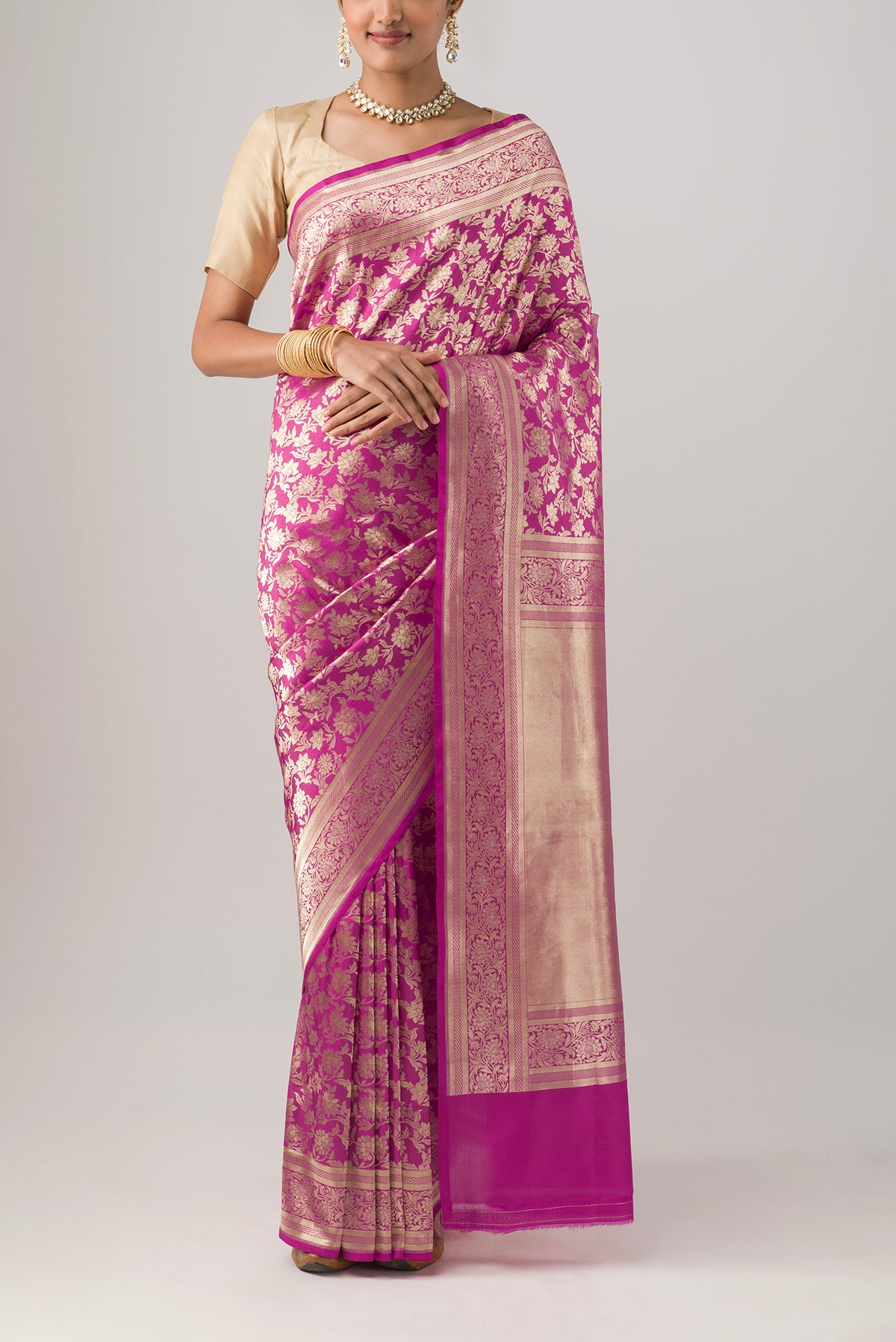 Pink Banarasi Silk Saree with Zari Brocade on the body and Zari Border displayed on a mannequin