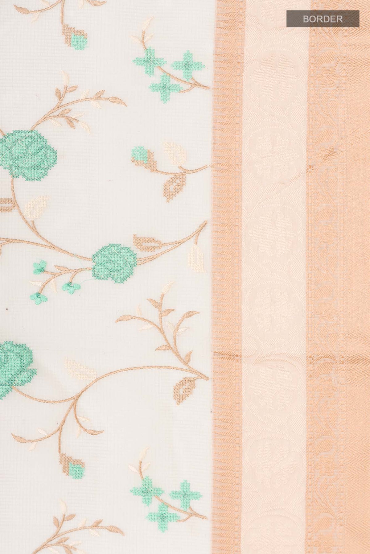 Border image of Cream Blended Kota Cotton Saree with Embroidery on the body and Thread Border. 