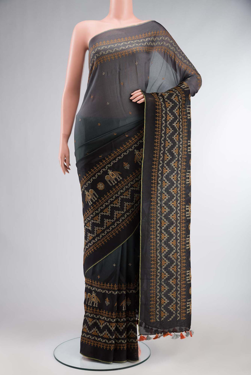 Multi Color Blended Art Silk Saree with Embroidery on the body and Embroidery Border.  displayed on a mannequin