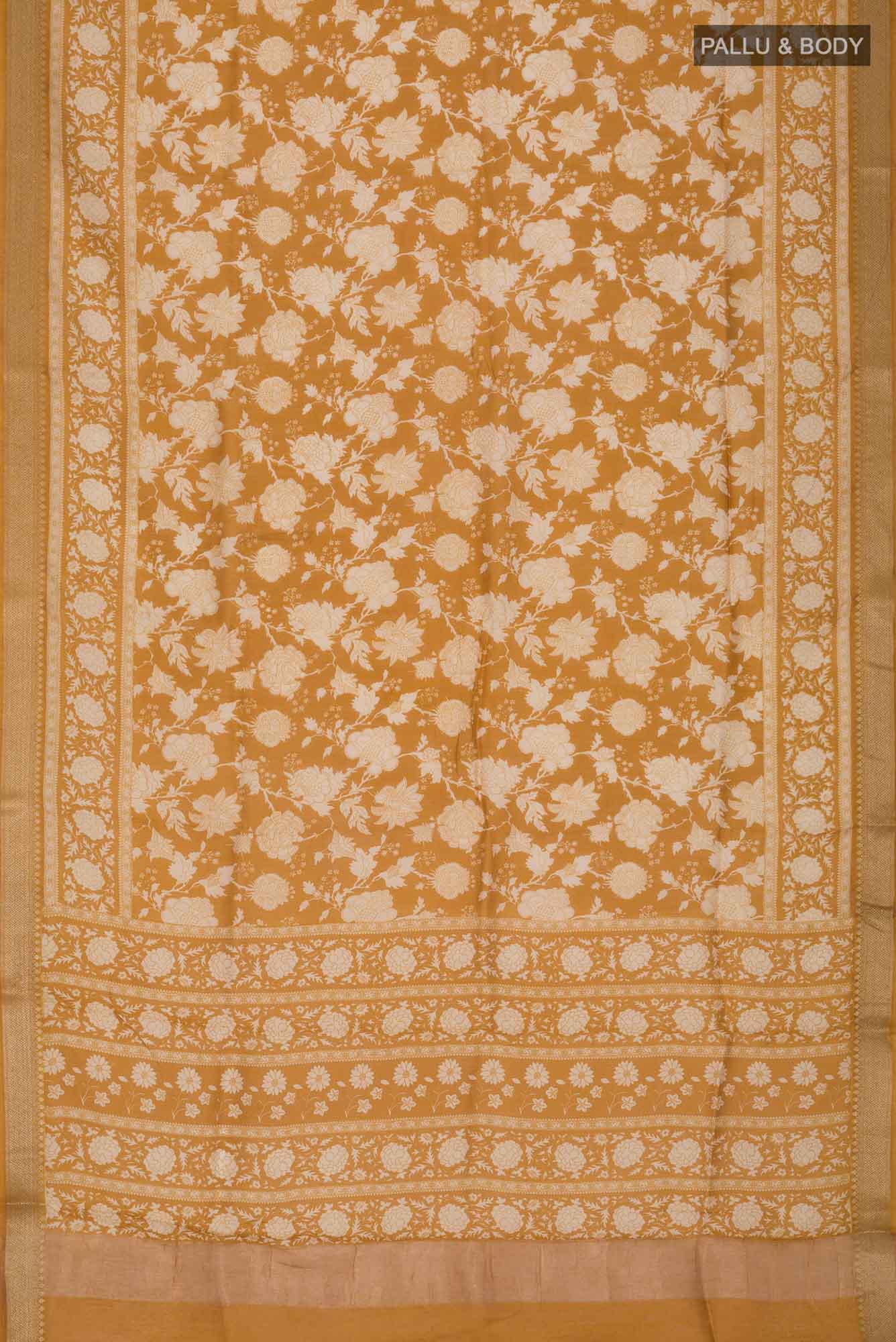 Flat view of Yellow Bhagalpuri Tussar Silk Saree with Floral Print on the body and Zari Border. 