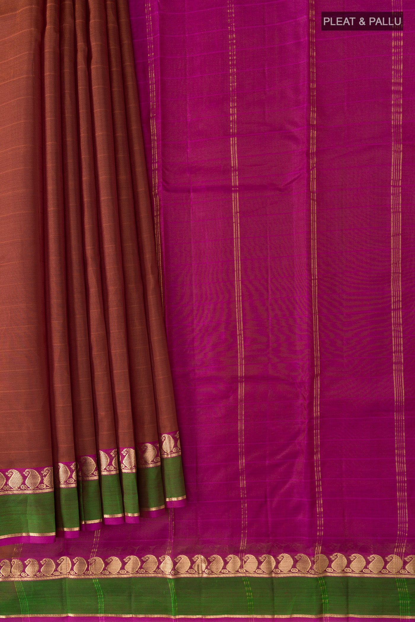 Pleats and pallu of Orange Kanchipuram Silk Saree with Stripes on the body and Zari Border. 