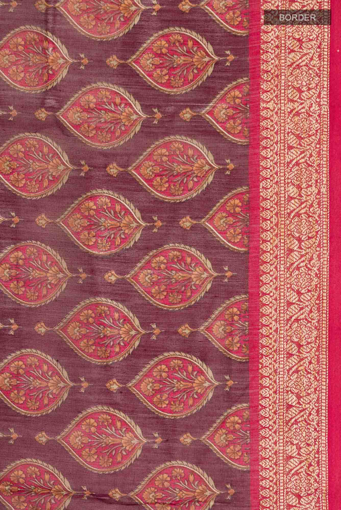 Border image of Maroon Silk Cotton Saree with Floral Print on the body and Zari Border. 