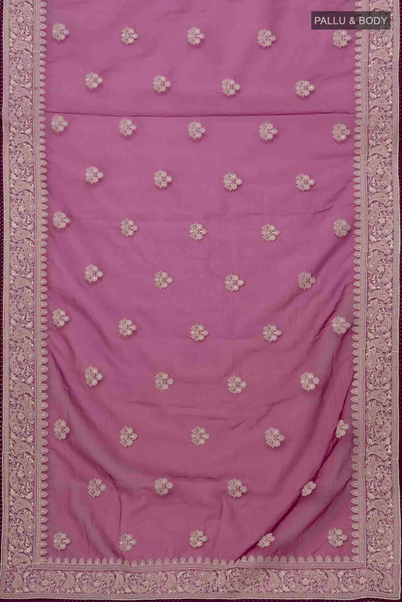 Flat view of Magenta Blended Organza Silk Saree with Embroidery on the body and Embroidery Border. 