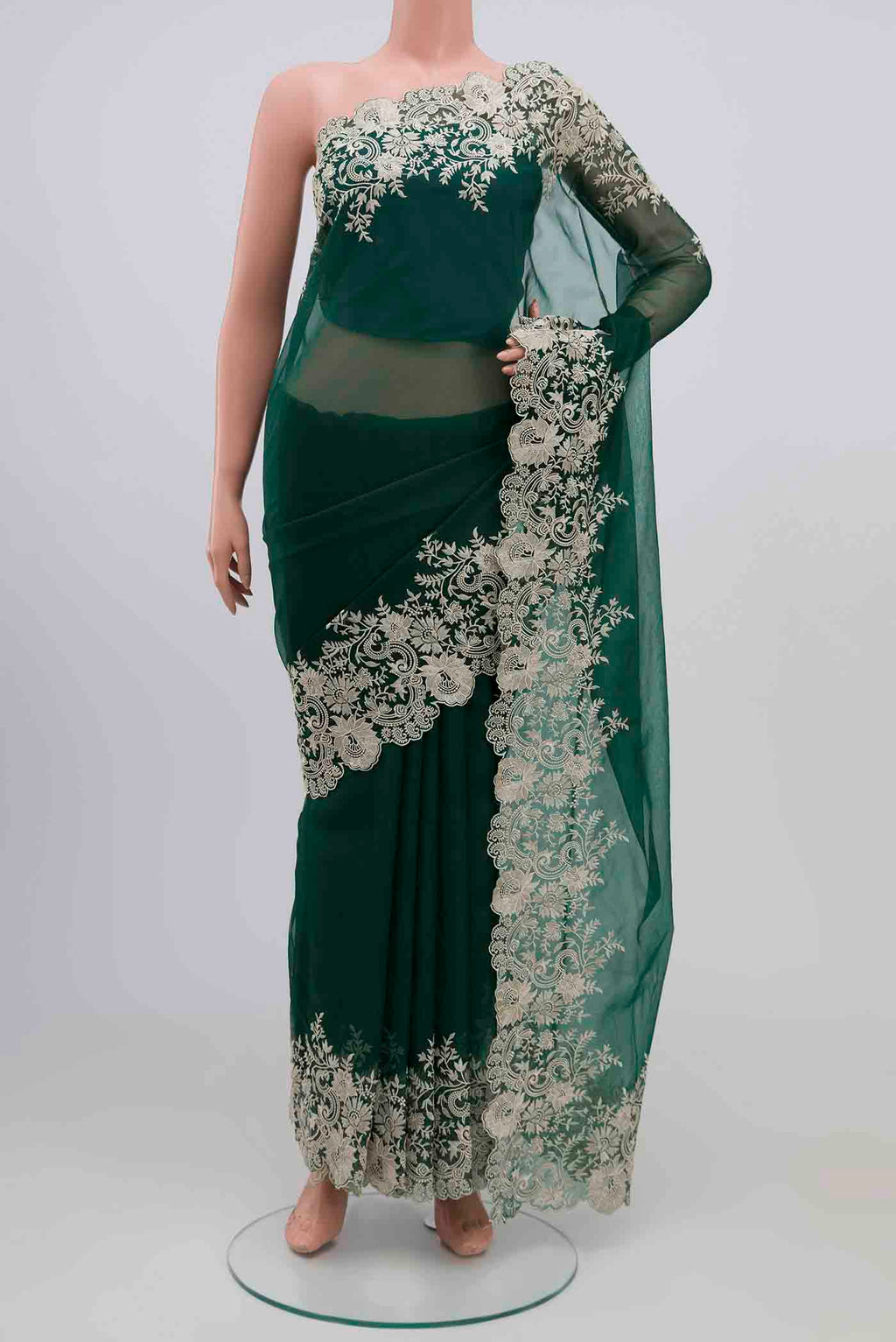 Green Blended Organza Silk Saree with Plain Body and Embroidery Border.  displayed on a mannequin