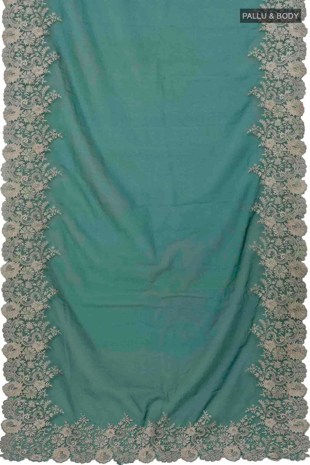 Flat view of Green Blended Organza Silk Saree with Plain Body and Embroidery Border. 