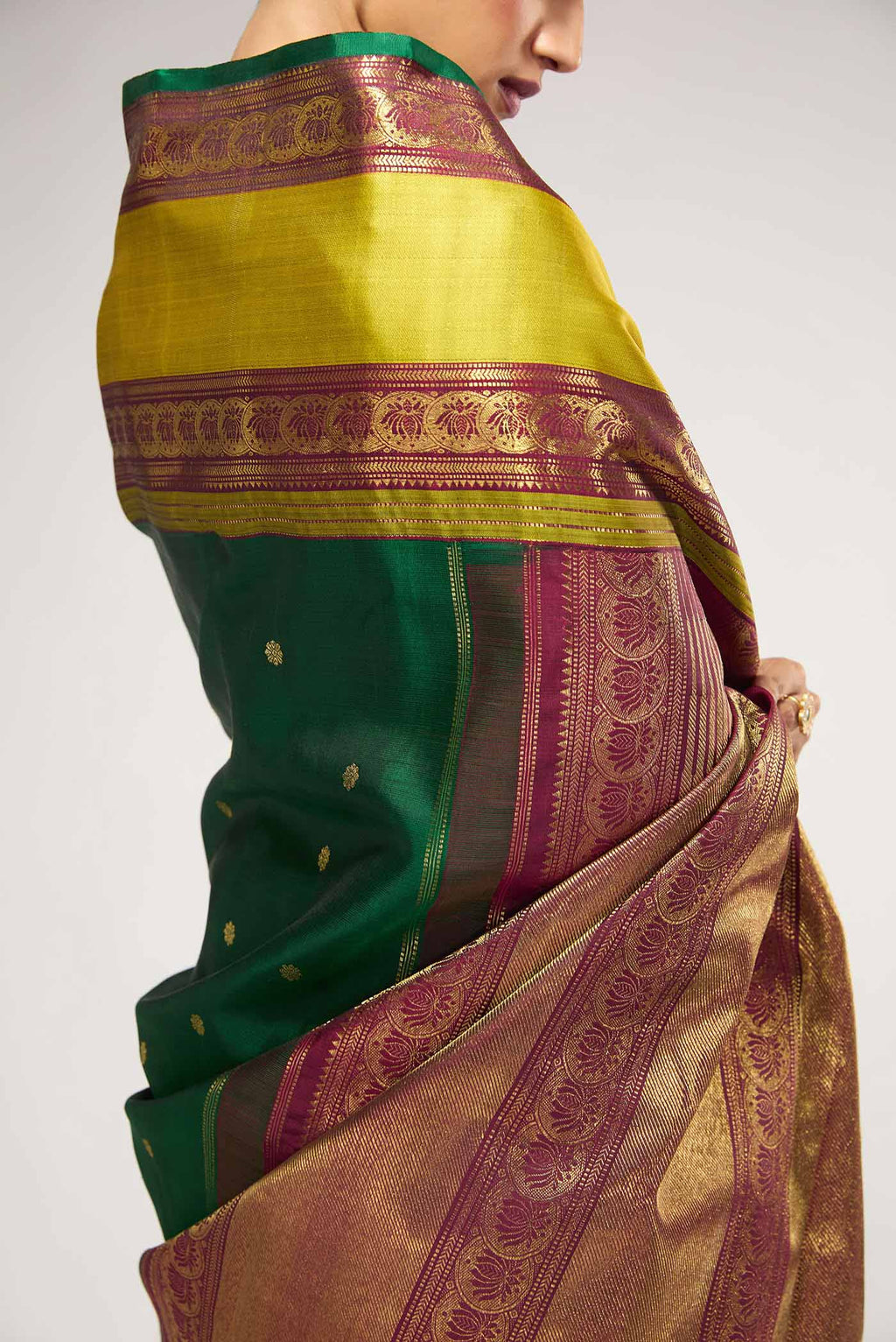 Close up image of the blouse of Green Pure Organza Silk Saree with Bird Print on the body and Without Border
