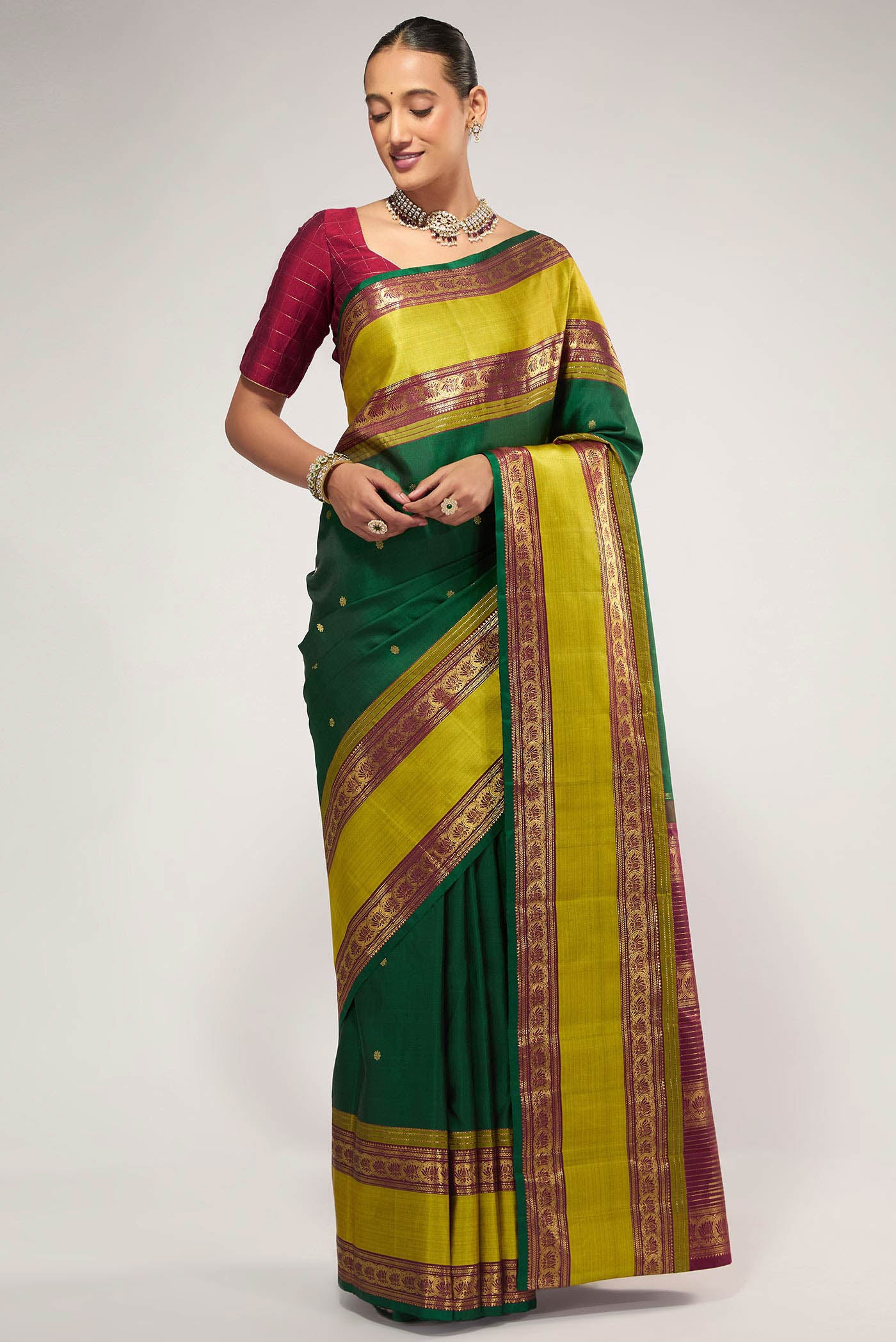 Green Pure Organza Silk Saree with Bird Print on the body and Without Border displayed on a mannequin
