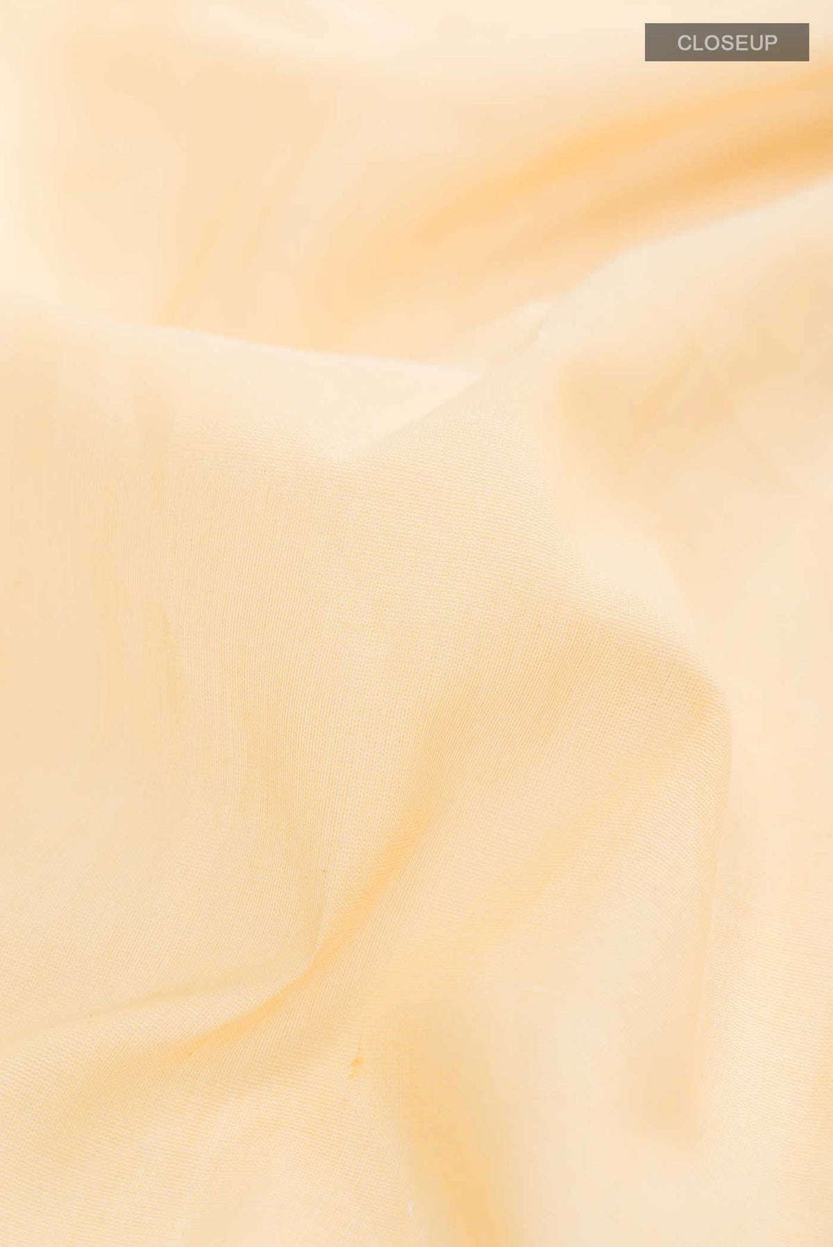 Close up of Yellow Bengal Cotton Saree with Jamdani on the body and Zari Border displaying folds