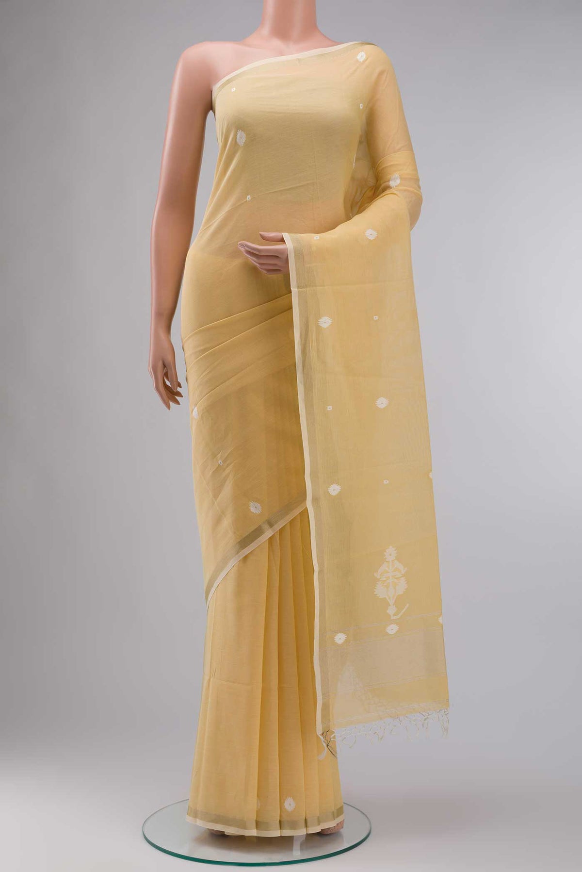 Yellow Bengal Cotton Saree with Jamdani on the body and Zari Border displayed on a mannequin