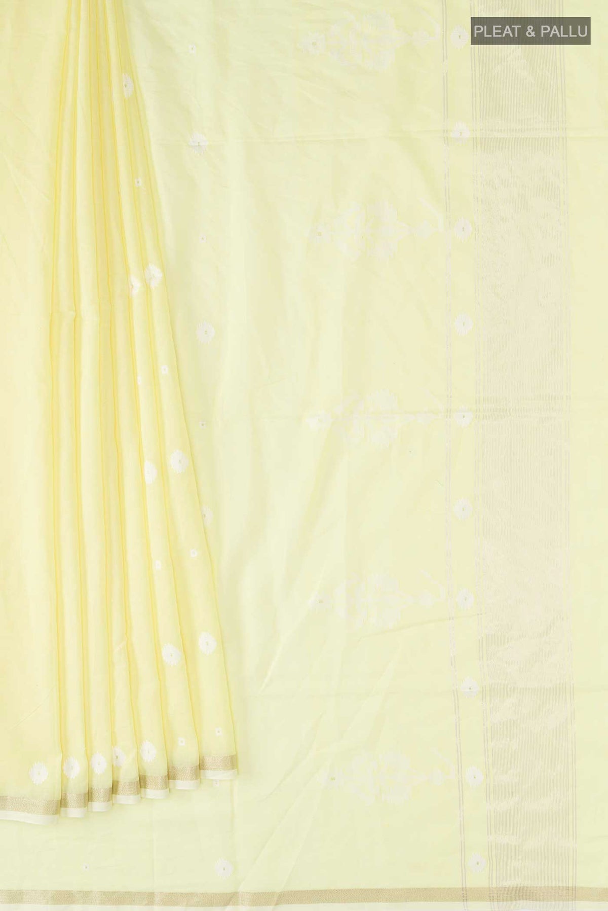 Pleats and pallu of Lemon Yellow Bengal Cotton Saree with Jamdani on the body and Zari Border