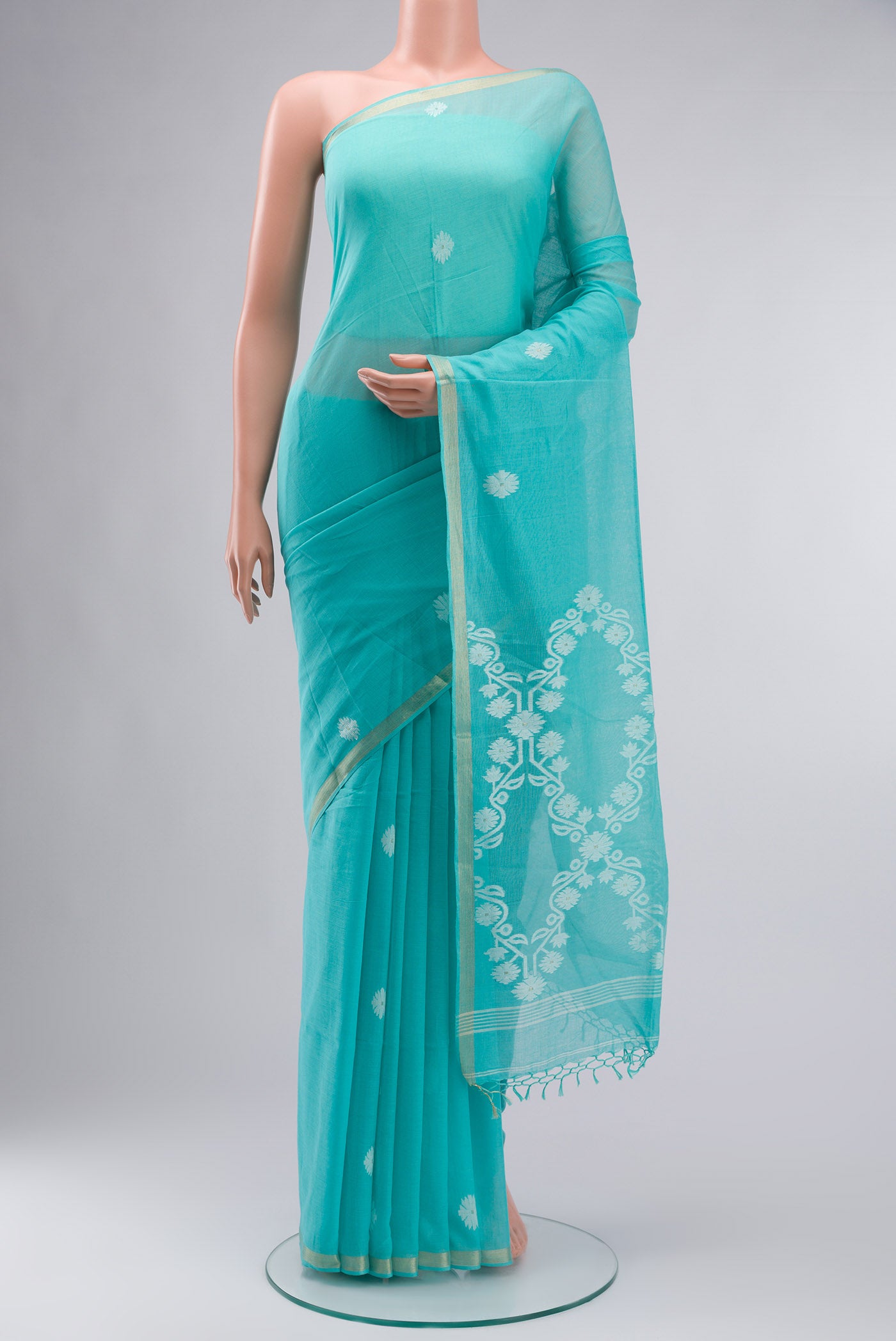 Turquoise Bengal Cotton Saree with Jamdani on the body and Zari Border displayed on a mannequin