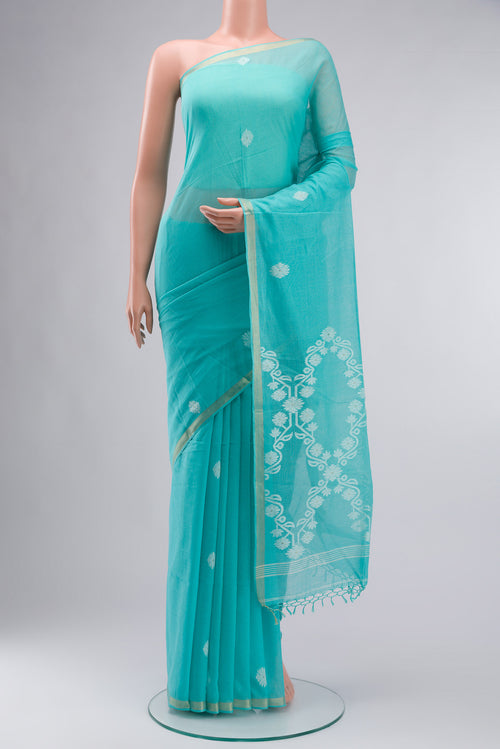 Turquoise Bengal Cotton Saree with Jamdani on the body and Zari Border displayed on a mannequin