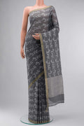 Grey Bengal Cotton Saree with Jamdani on the body and Zari Border displayed on a mannequin