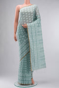 Light Green Bengal Cotton Saree with Jamdani on the body and Thread Border displayed on a mannequin