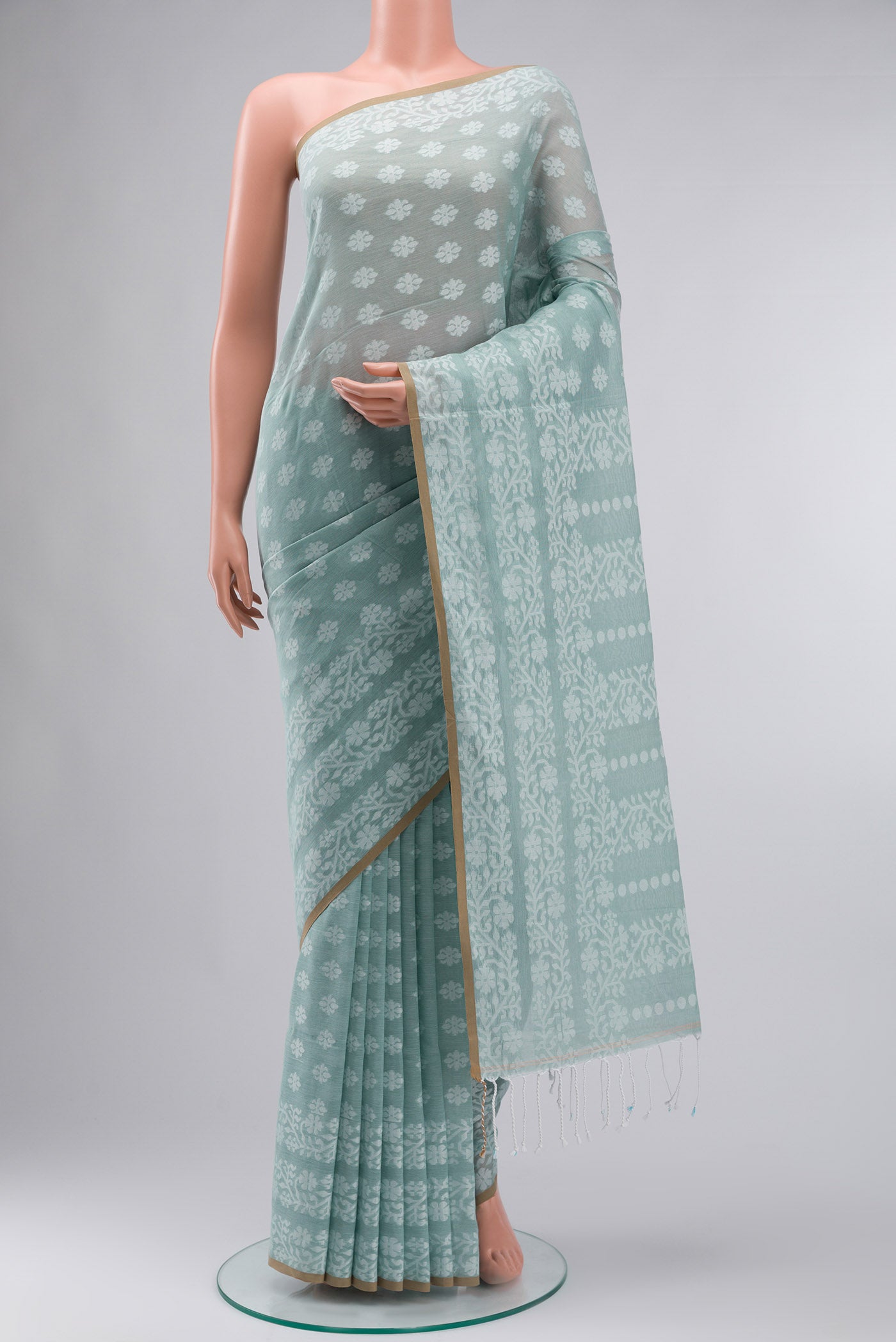 Light Green Bengal Cotton Saree with Jamdani on the body and Thread Border displayed on a mannequin