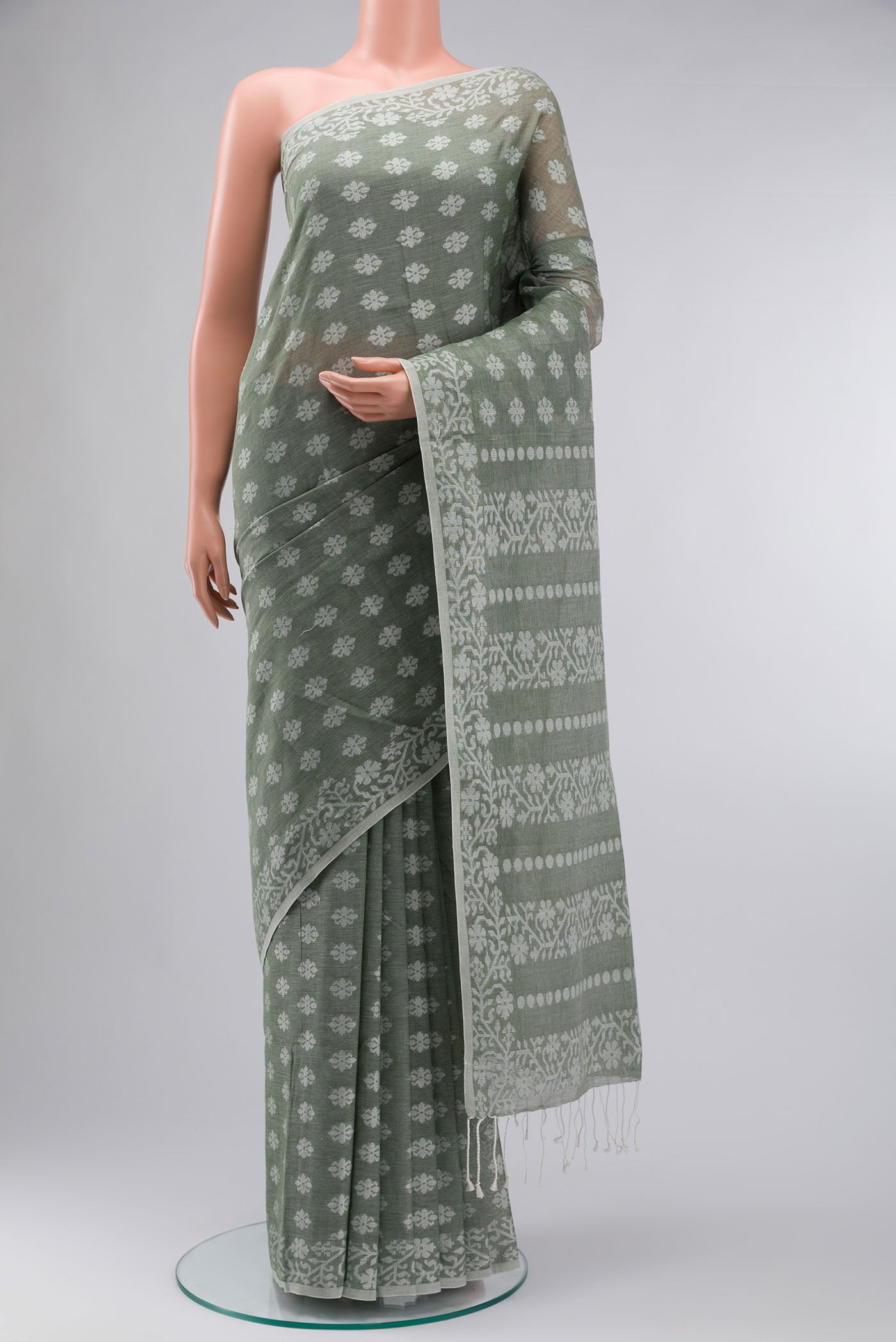 Olive Green Bengal Cotton Saree with Jamdani on the body and Thread Border displayed on a mannequin