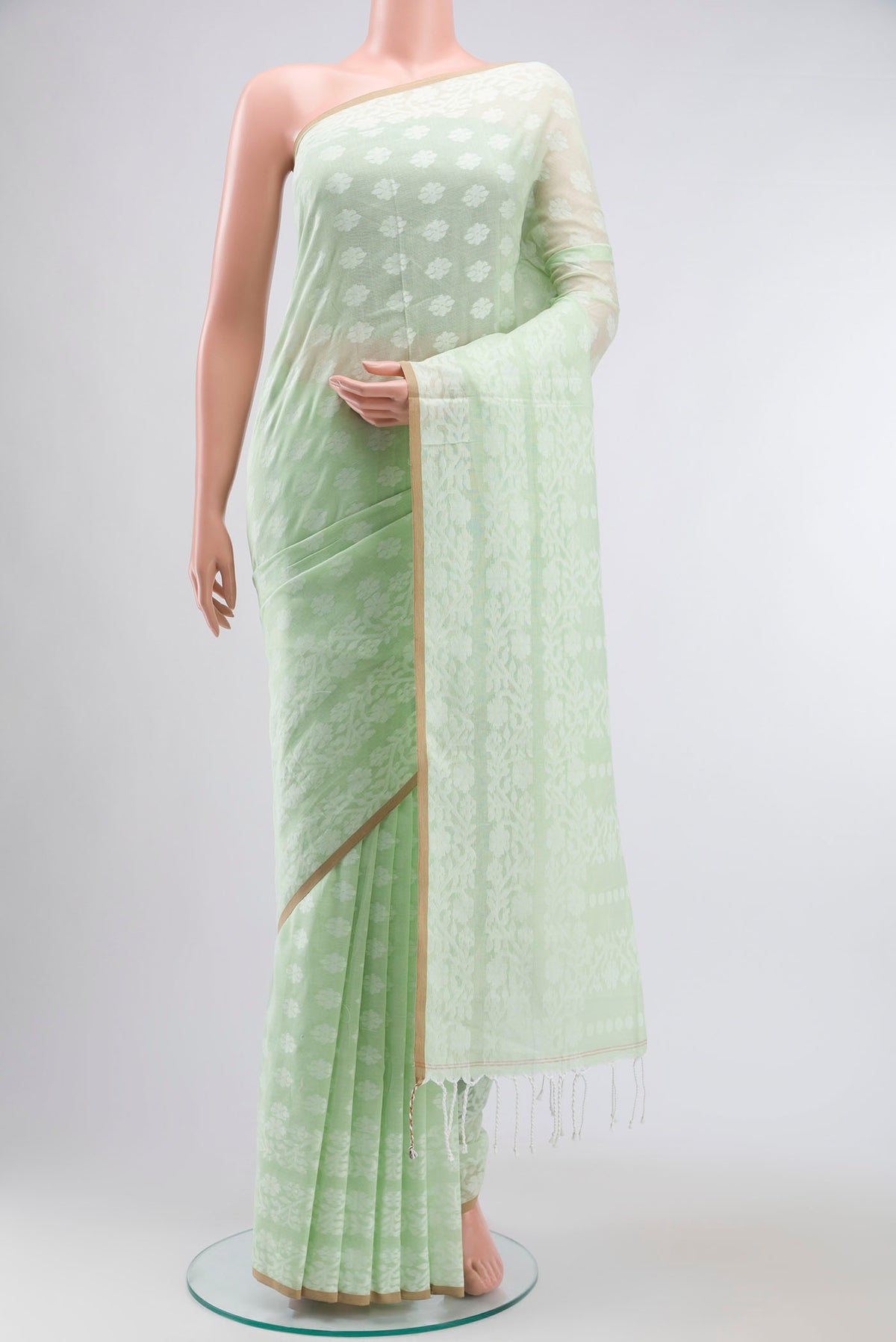 Pista Green Bengal Cotton Saree with Jamdani on the body and Thread Border displayed on a mannequin