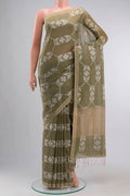 Green Bengal Cotton Saree with Jamdani on the body and Zari Border displayed on a mannequin