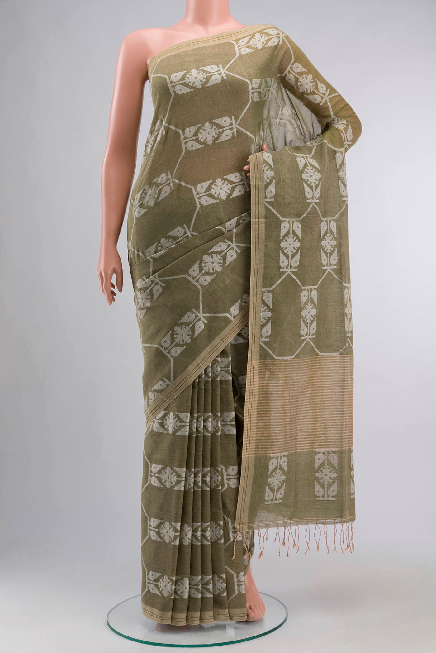 Green Bengal Cotton Saree with Jamdani on the body and Zari Border displayed on a mannequin
