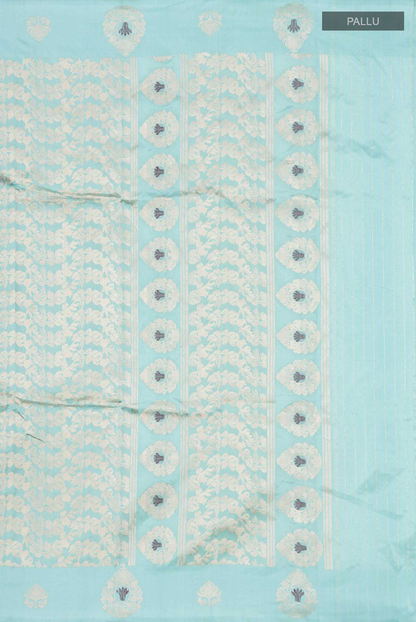 Close up image of the pallu of Turquoise Banarasi Katan Silk Saree with Zari Butta on the body and Zari Border