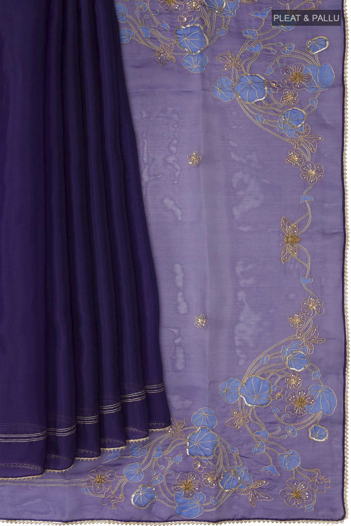Pleats and pallu of Navy Blue Organza Silk Saree with Plain Body and Embroidery Border