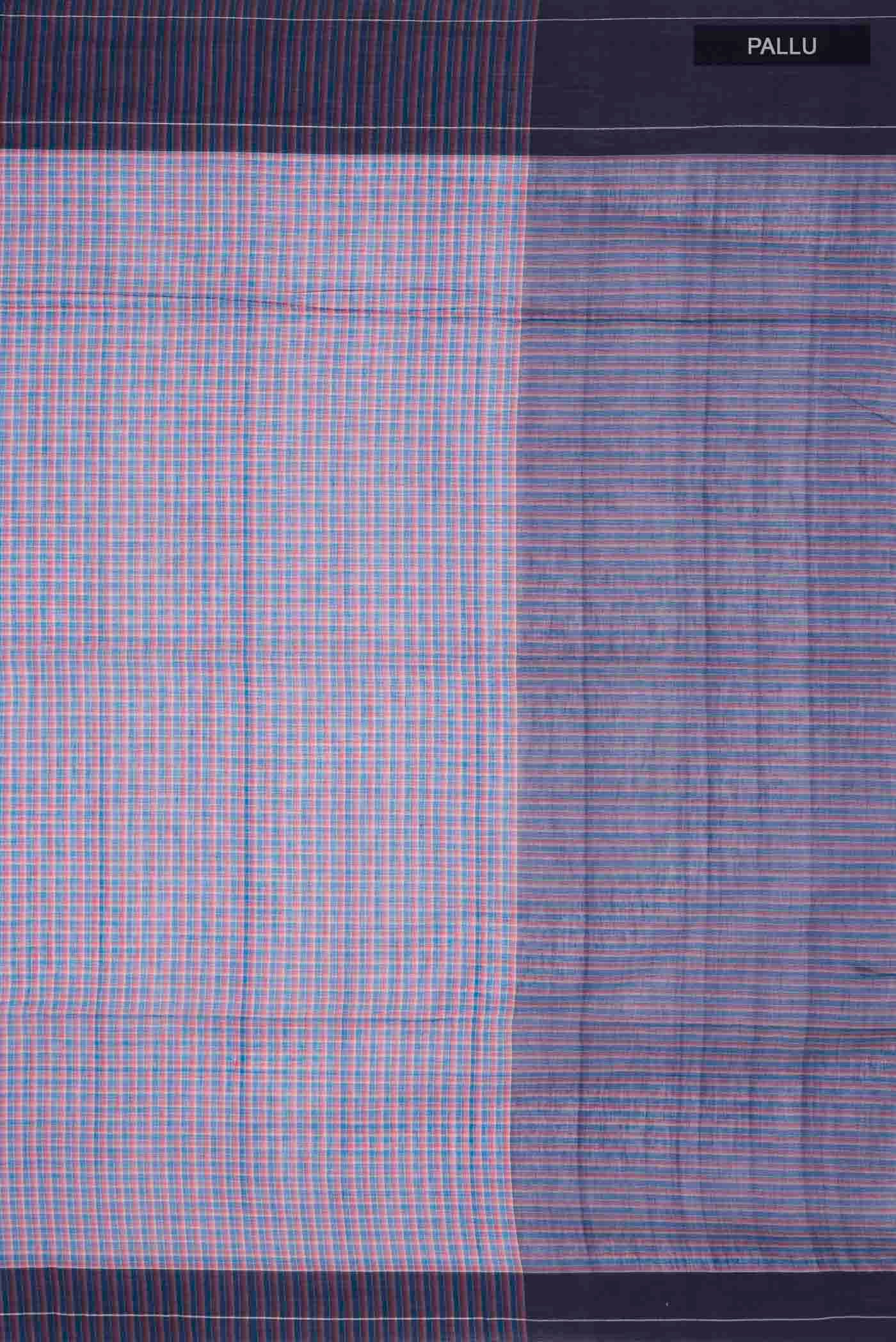 Close up image of the pallu of Patang features fine multi-coloured checks woven using four harmonious hues, creating a lively yet balanced design Translating to ?te)n Hindi, the saree reflects the light, easy spirit of a patang gliding across an open sky The border and pallu are minimal, finished with delicate zari accents that add subtle richness With its balanced play of colour, it makes for a breathable, comfortable drape