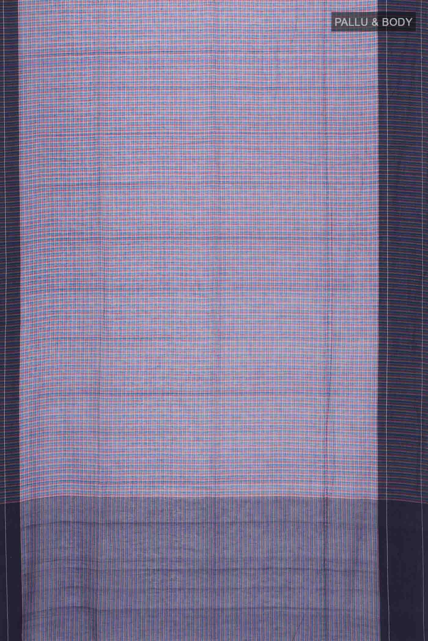 Flat view of Patang features fine multi-coloured checks woven using four harmonious hues, creating a lively yet balanced design Translating to ?te)n Hindi, the saree reflects the light, easy spirit of a patang gliding across an open sky The border and pallu are minimal, finished with delicate zari accents that add subtle richness With its balanced play of colour, it makes for a breathable, comfortable drape