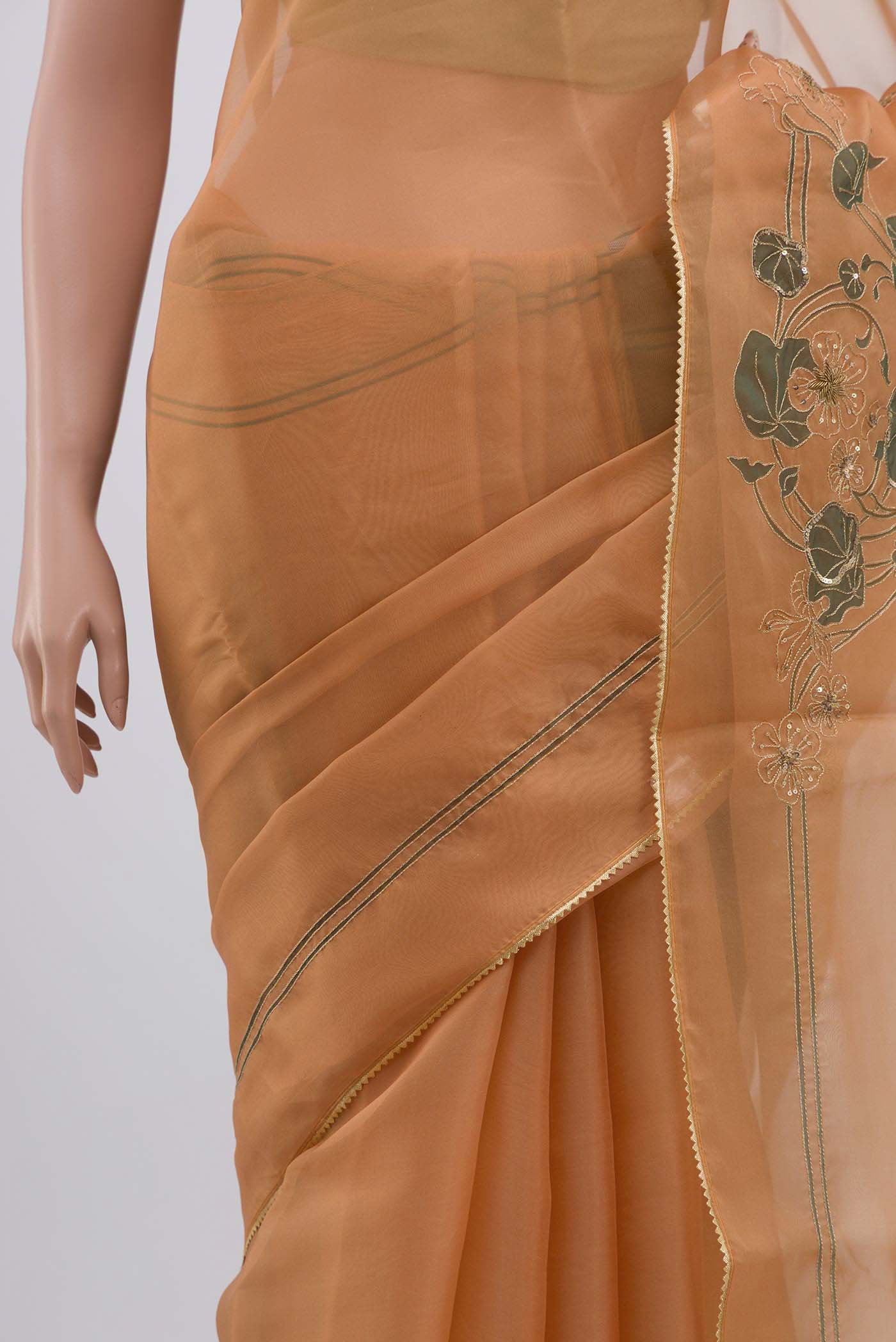 Border image of Orange Organza Silk Saree with Plain Body and Attached Border