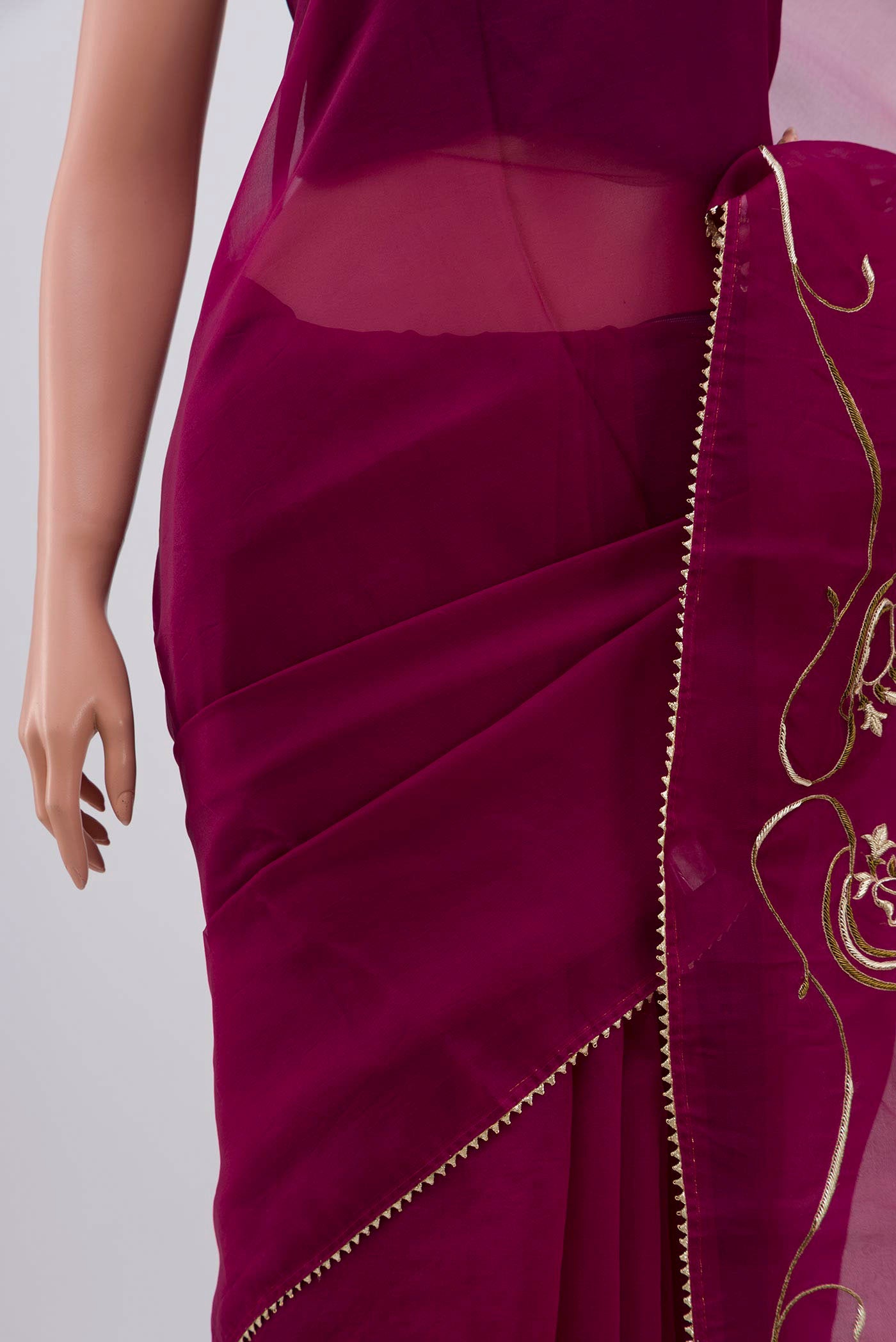 Close up image of the pallu of Purple Organza Silk Saree with Embroidery on the body and Attached Border